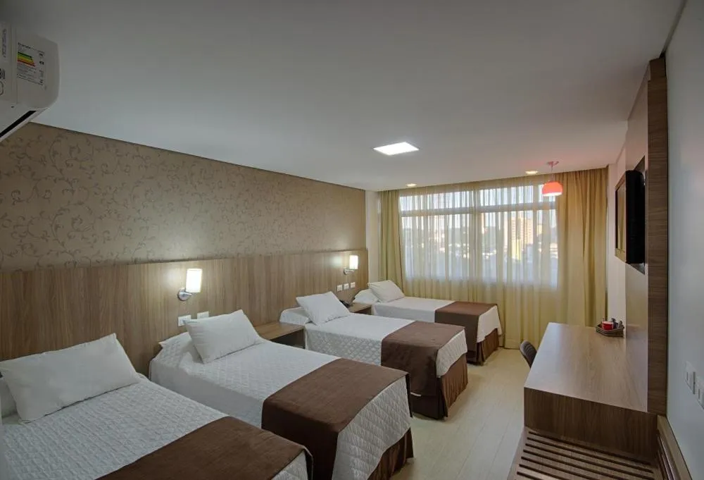 Bed in Foz Presidente Comfort Hotel