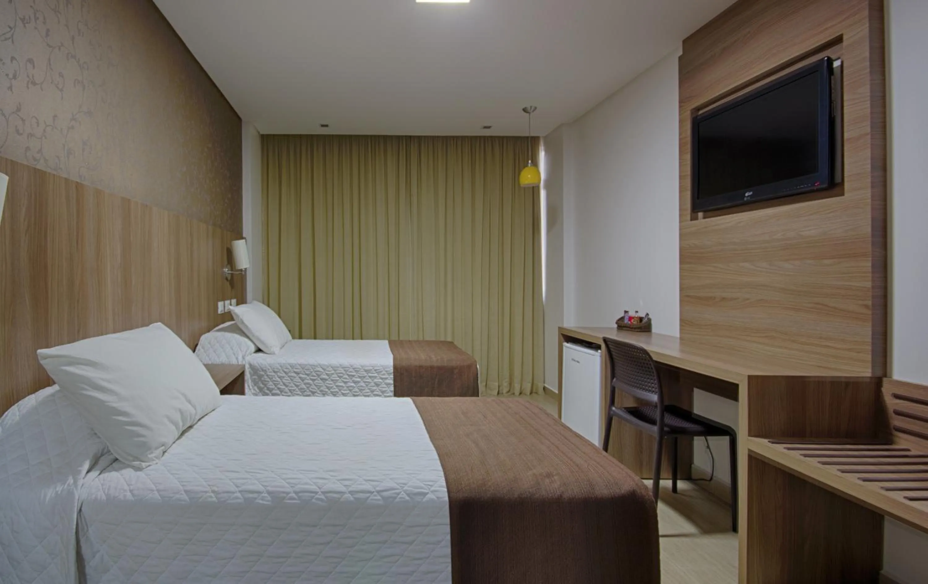 Bed in Foz Presidente Comfort Hotel