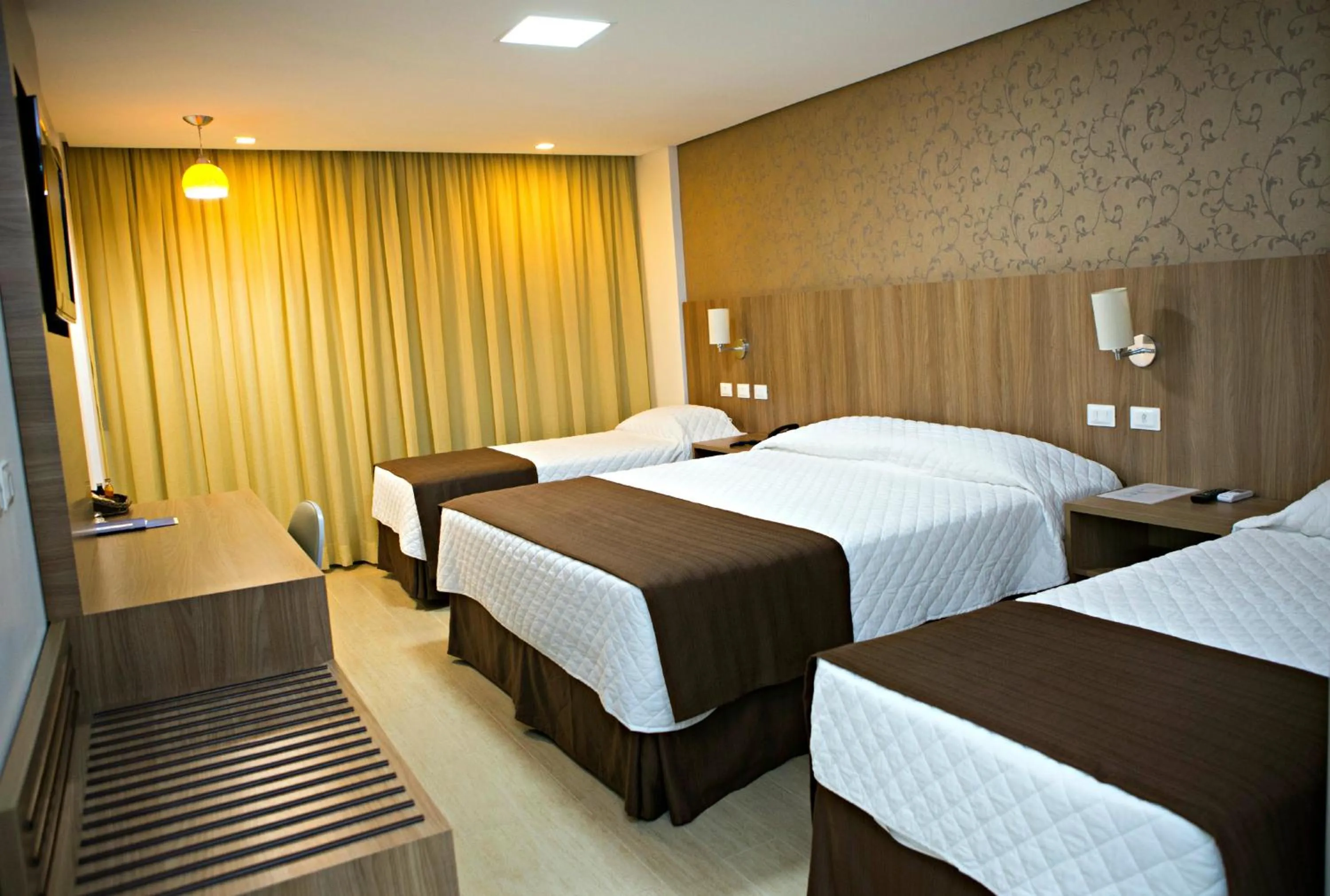 Bed in Foz Presidente Comfort Hotel