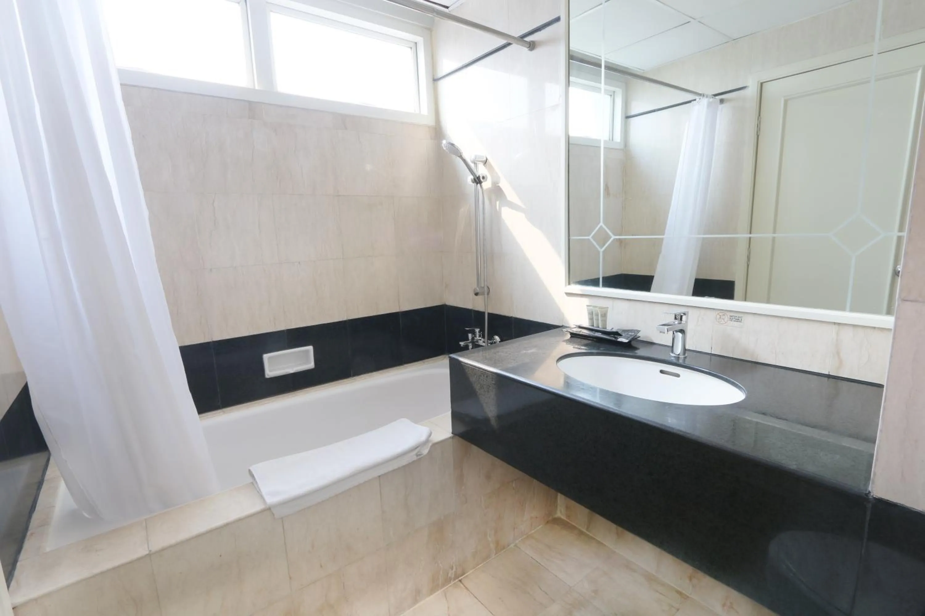 Bathroom in Java Paragon Hotel & Residences