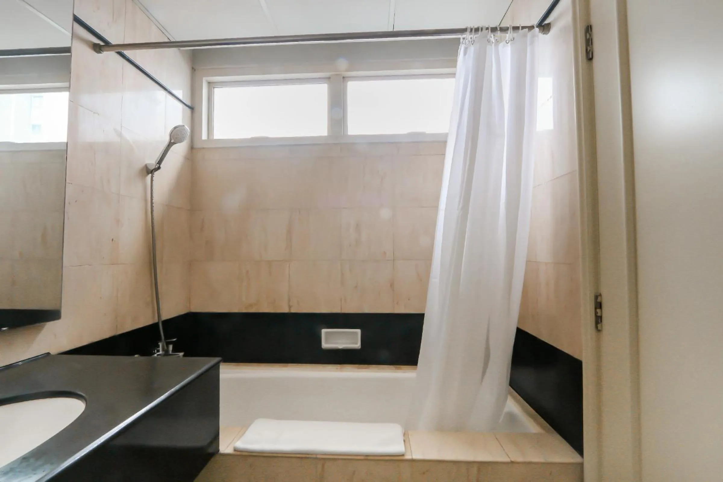 Bath in Java Paragon Hotel & Residences