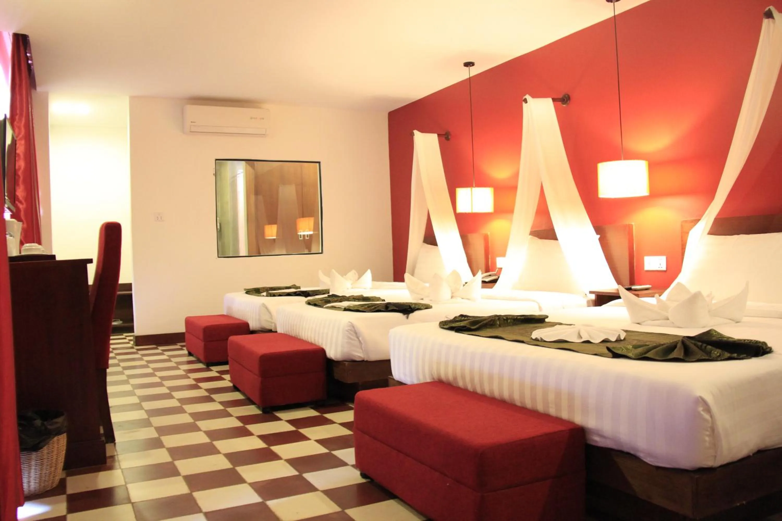 Bed in Mekong Angkor Palace Hotel