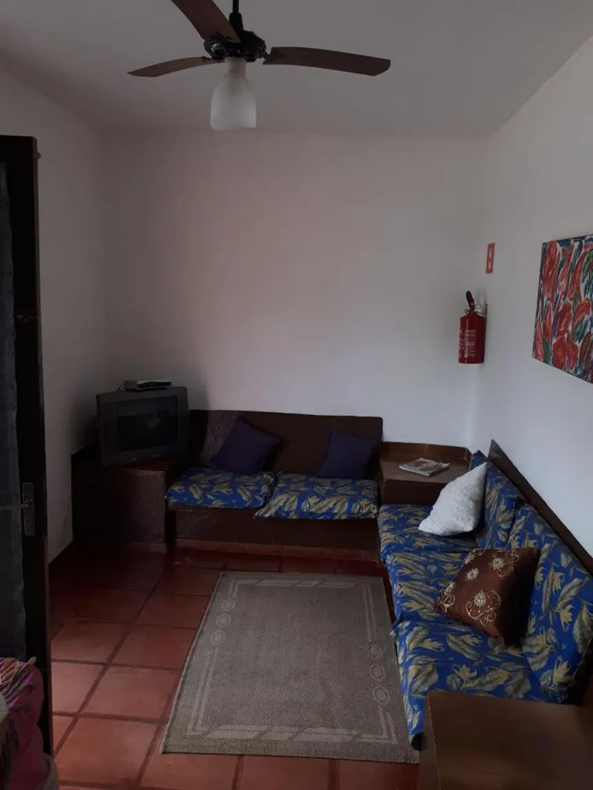 Living room in Pousada Chalés Vereda do Sol