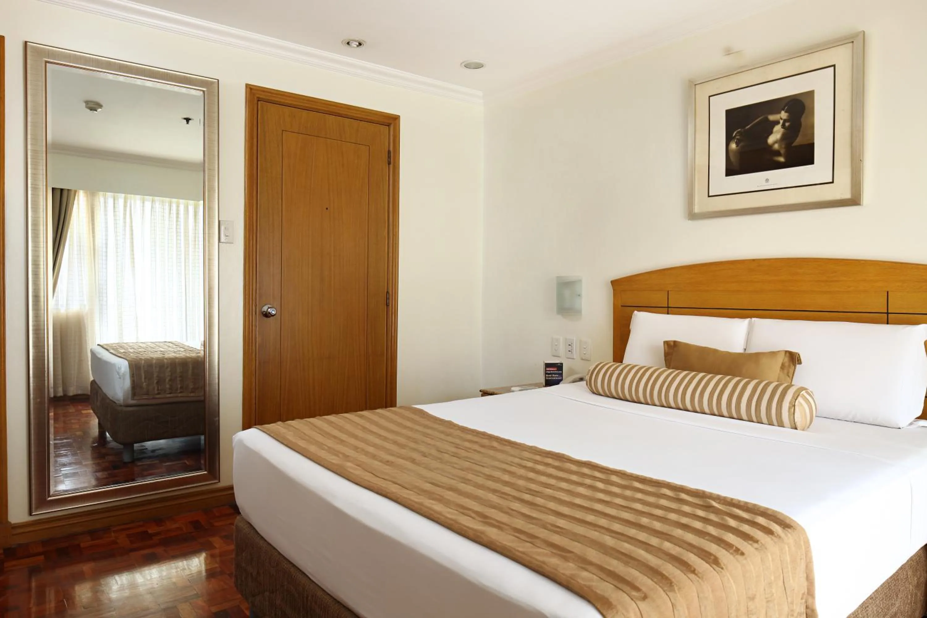 Bed in City Garden Suites Manila