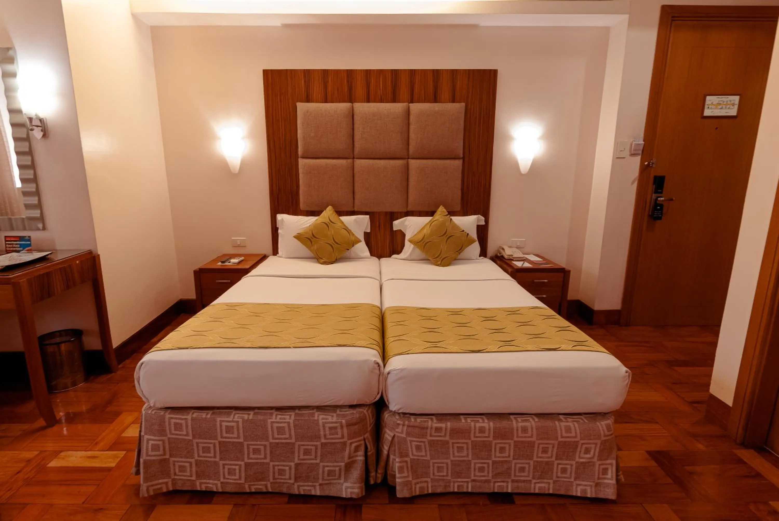 Bed in City Garden Suites Manila