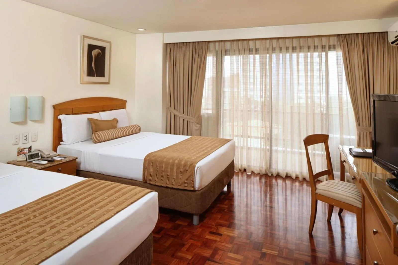 Bed in City Garden Suites Manila