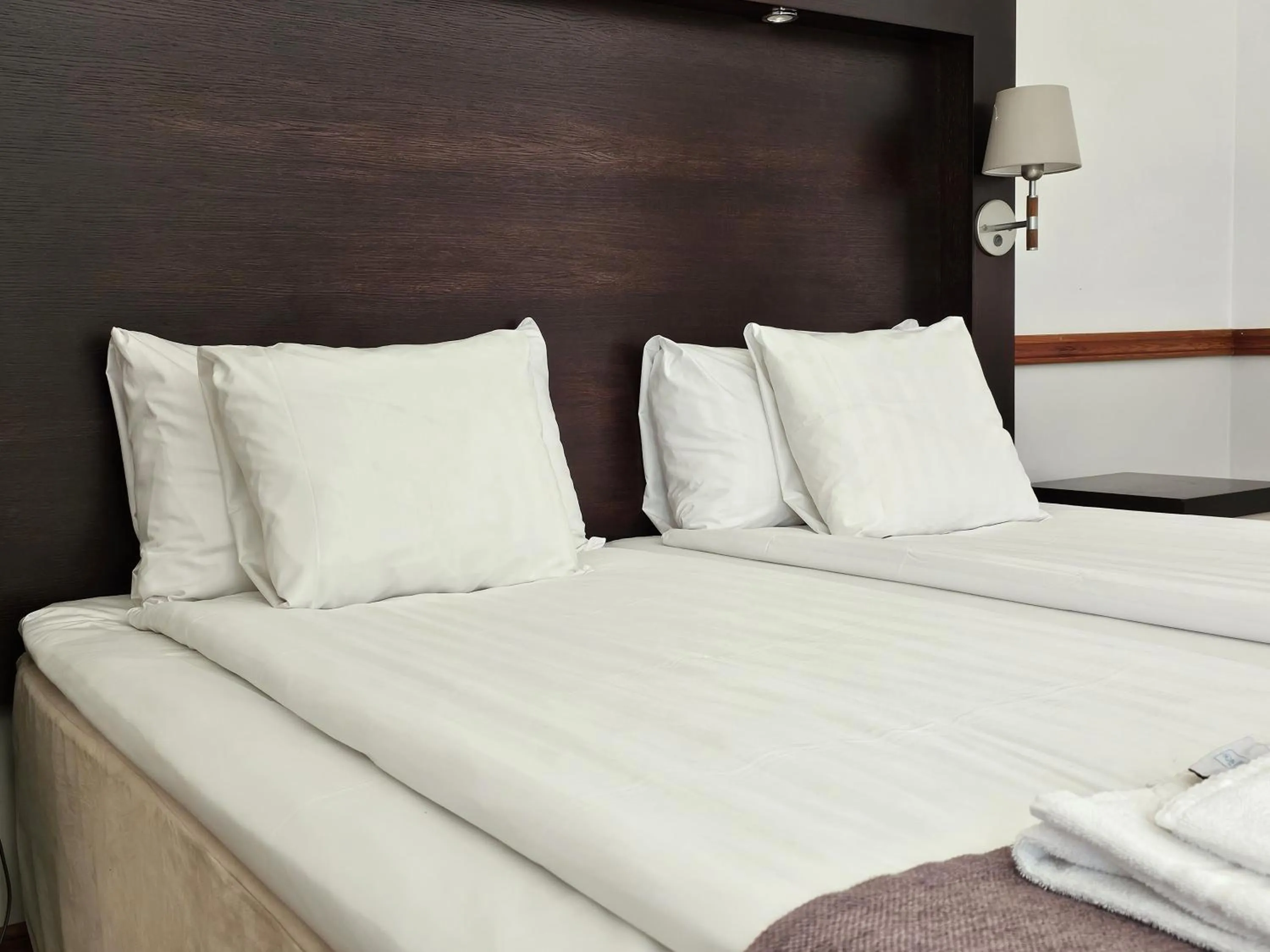 Bed in Hotel Skansen