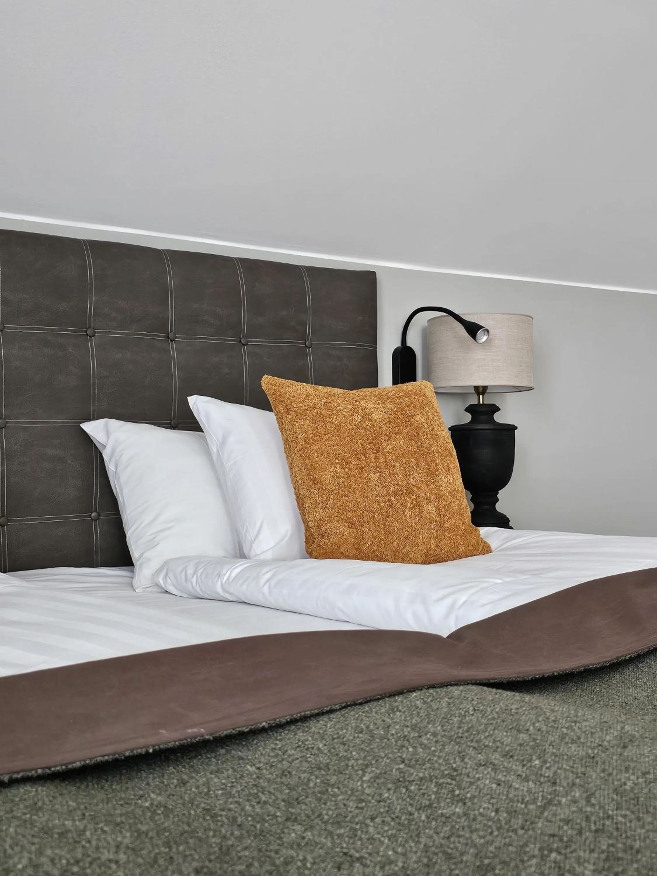 Bed in Hotel Skansen