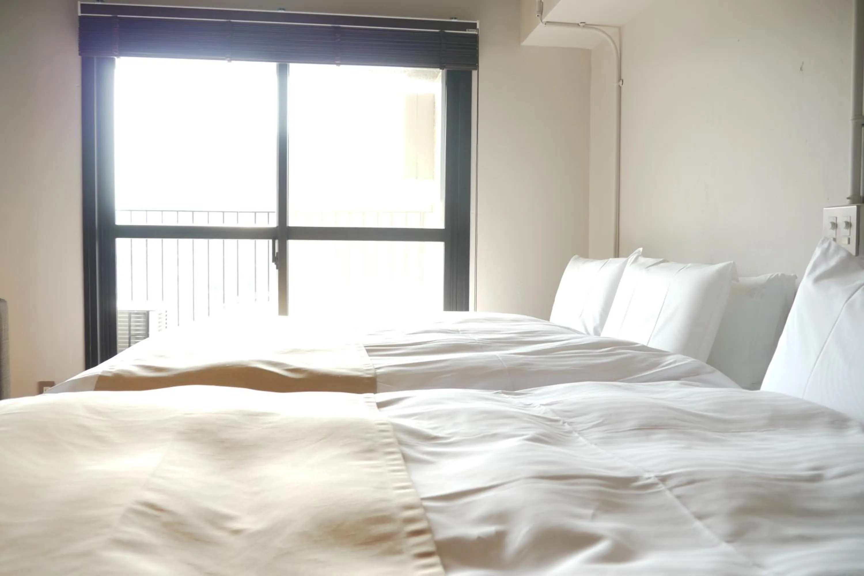 Bed in A Good Day Fukuoka Riverside