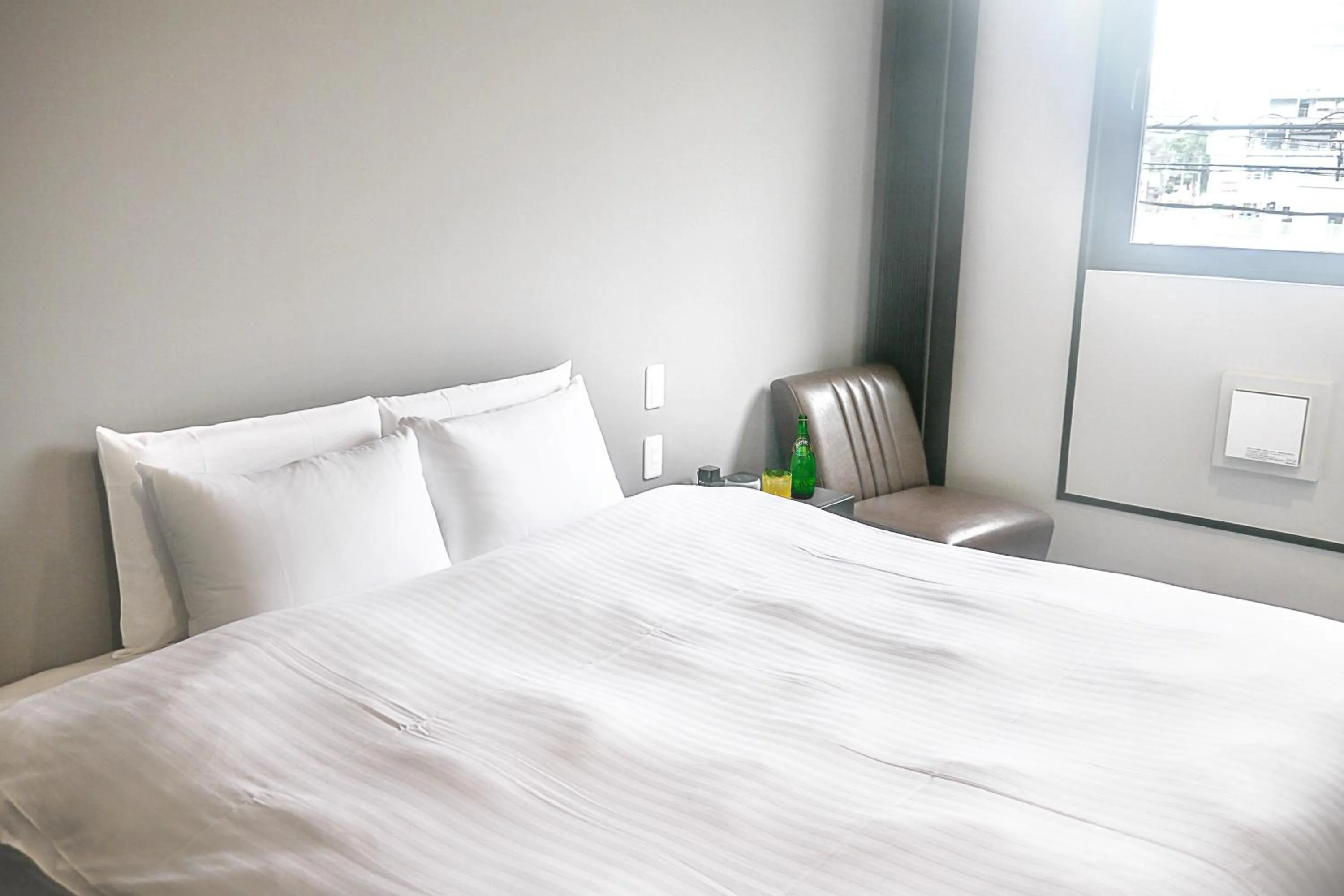 Bed in A Good Day Fukuoka Riverside