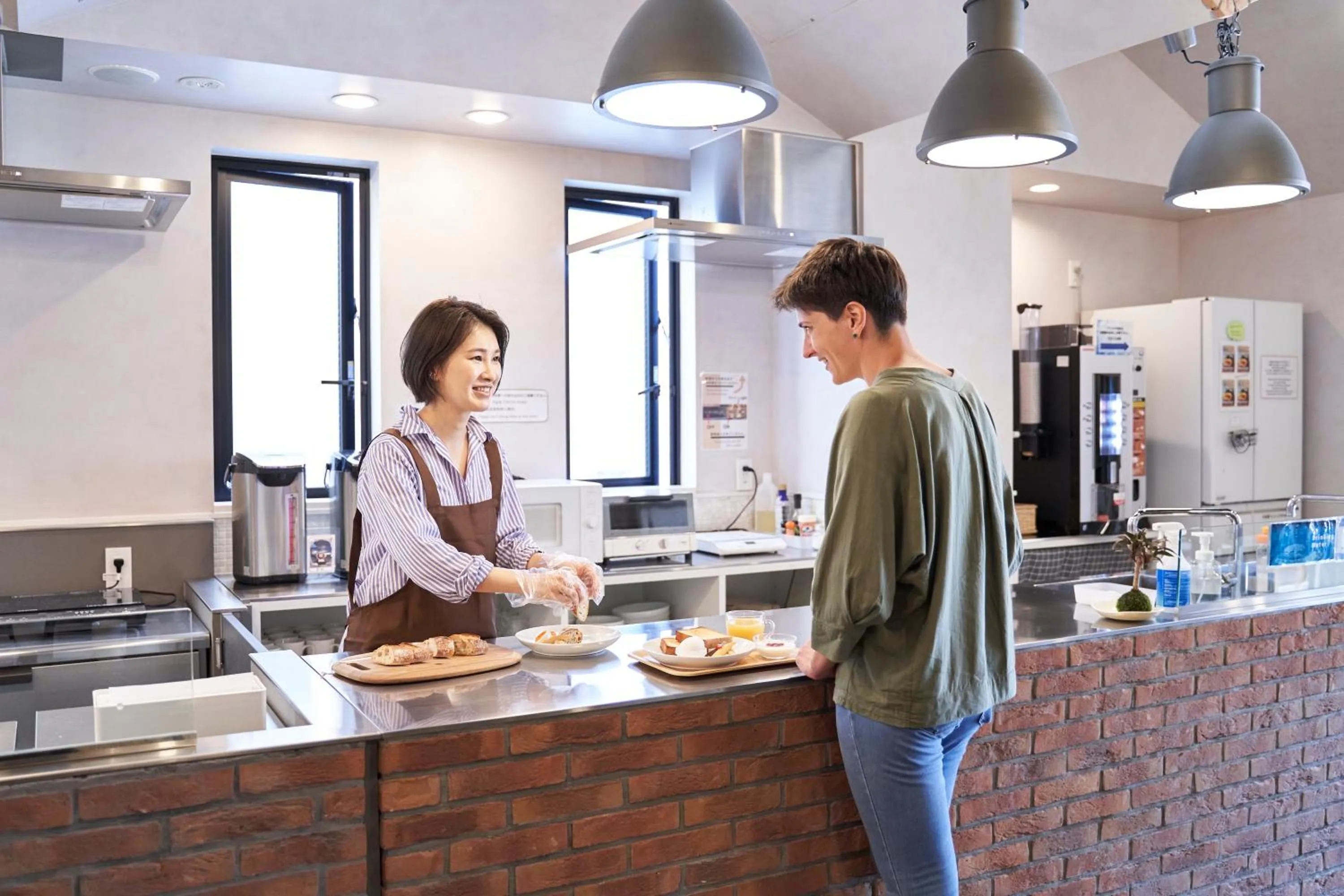 Communal kitchen in WeBase Hakata Hostel