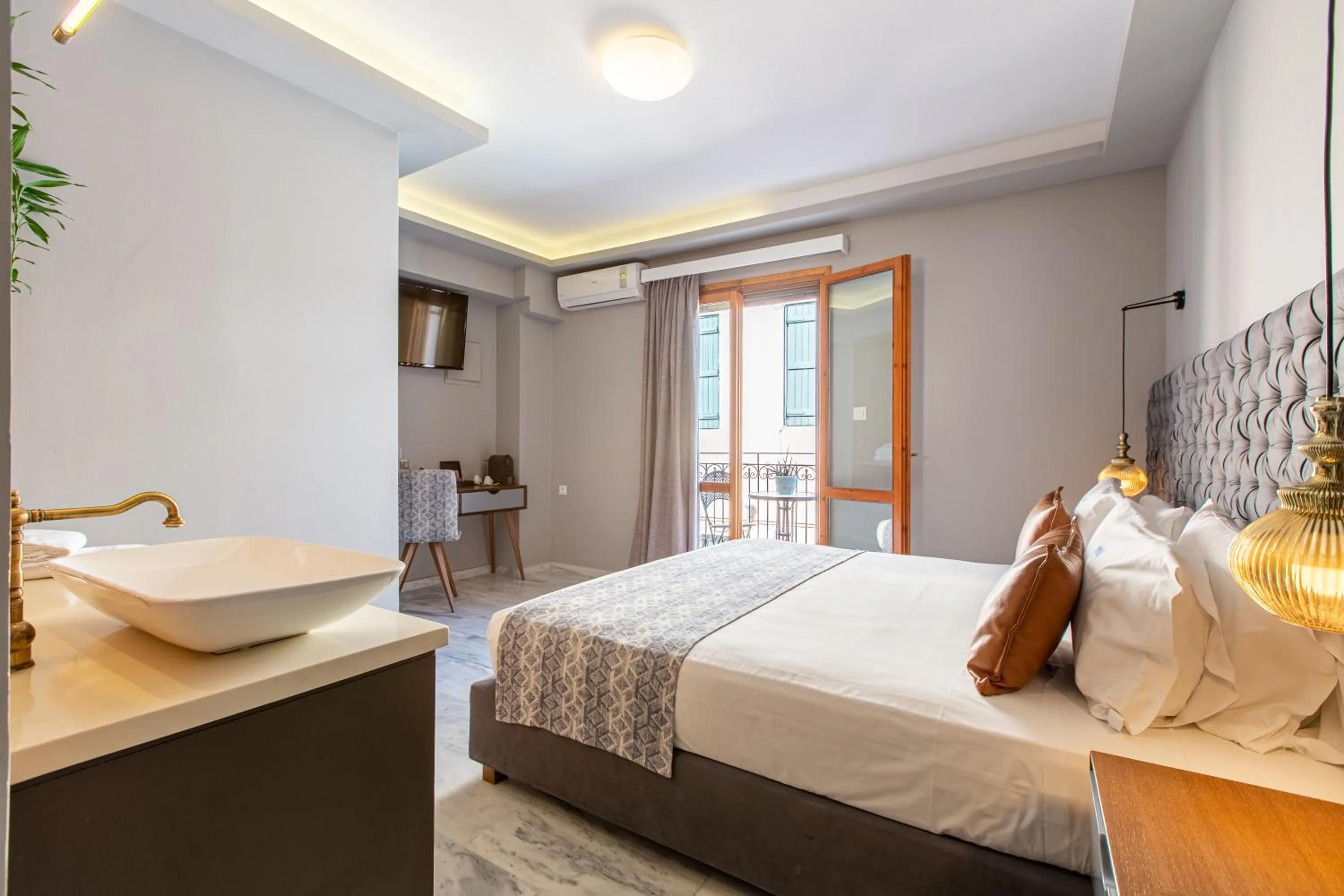 Bed in Minaret Suites and Apartments