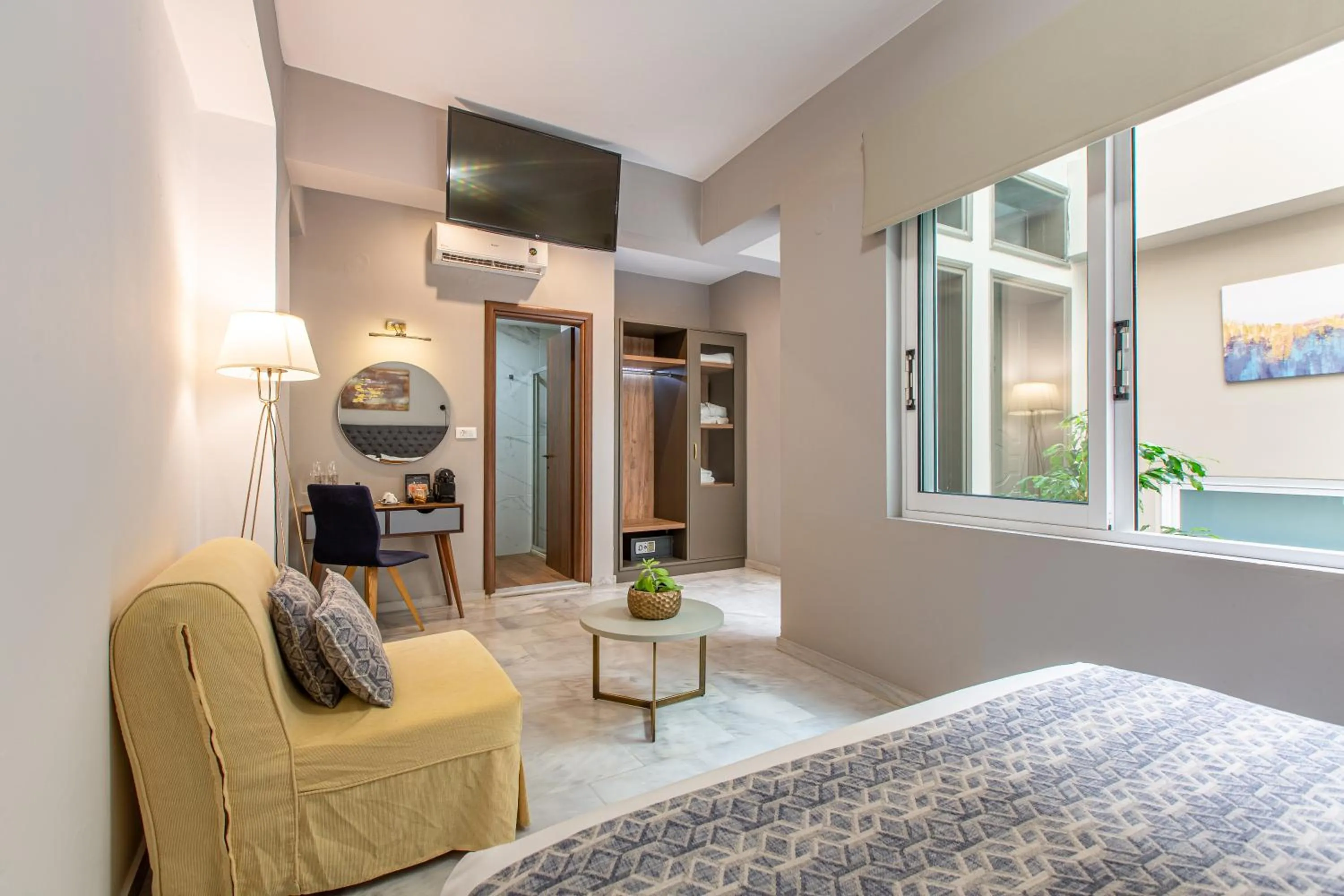 Bed in Minaret Suites and Apartments