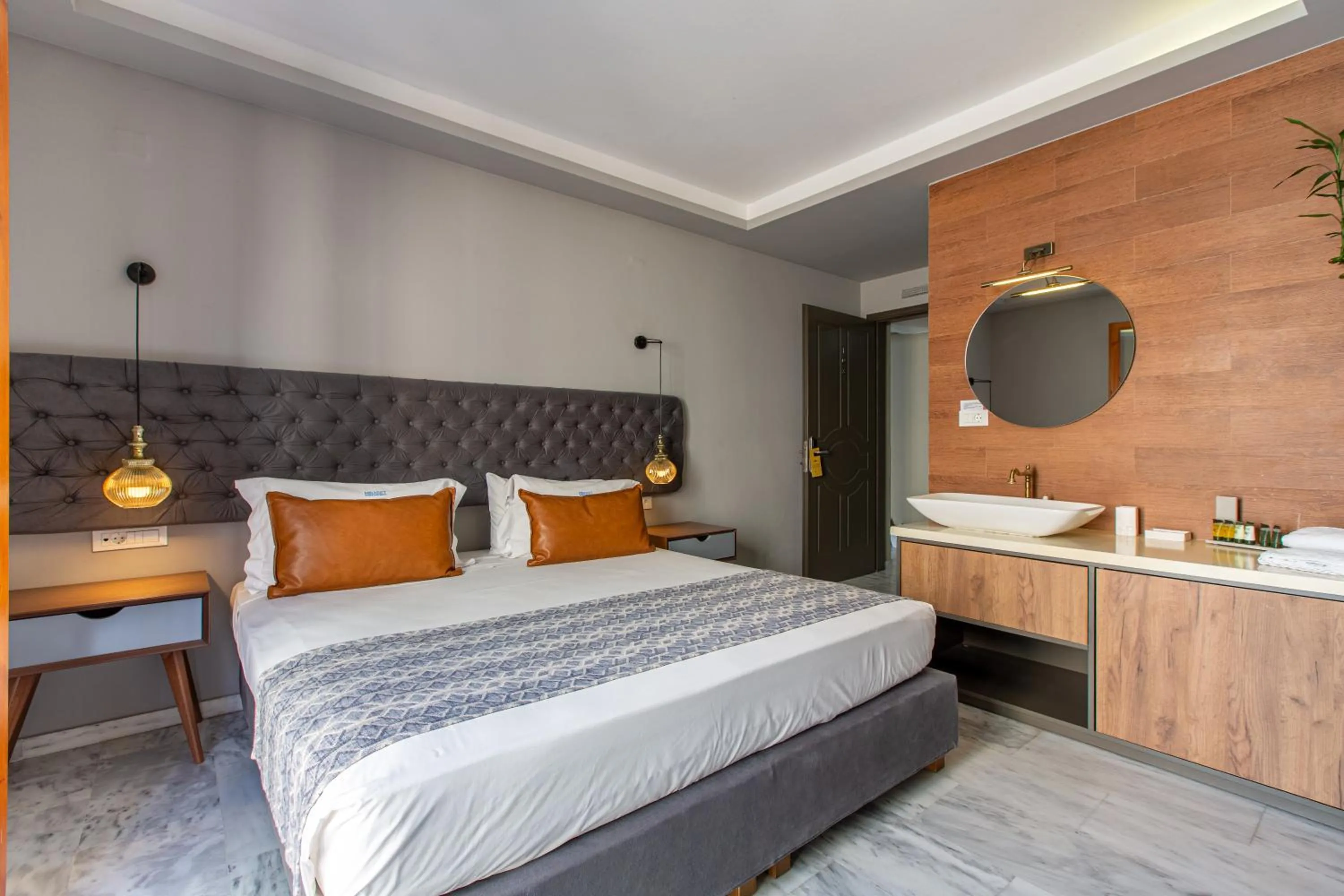 Bed in Minaret Suites and Apartments