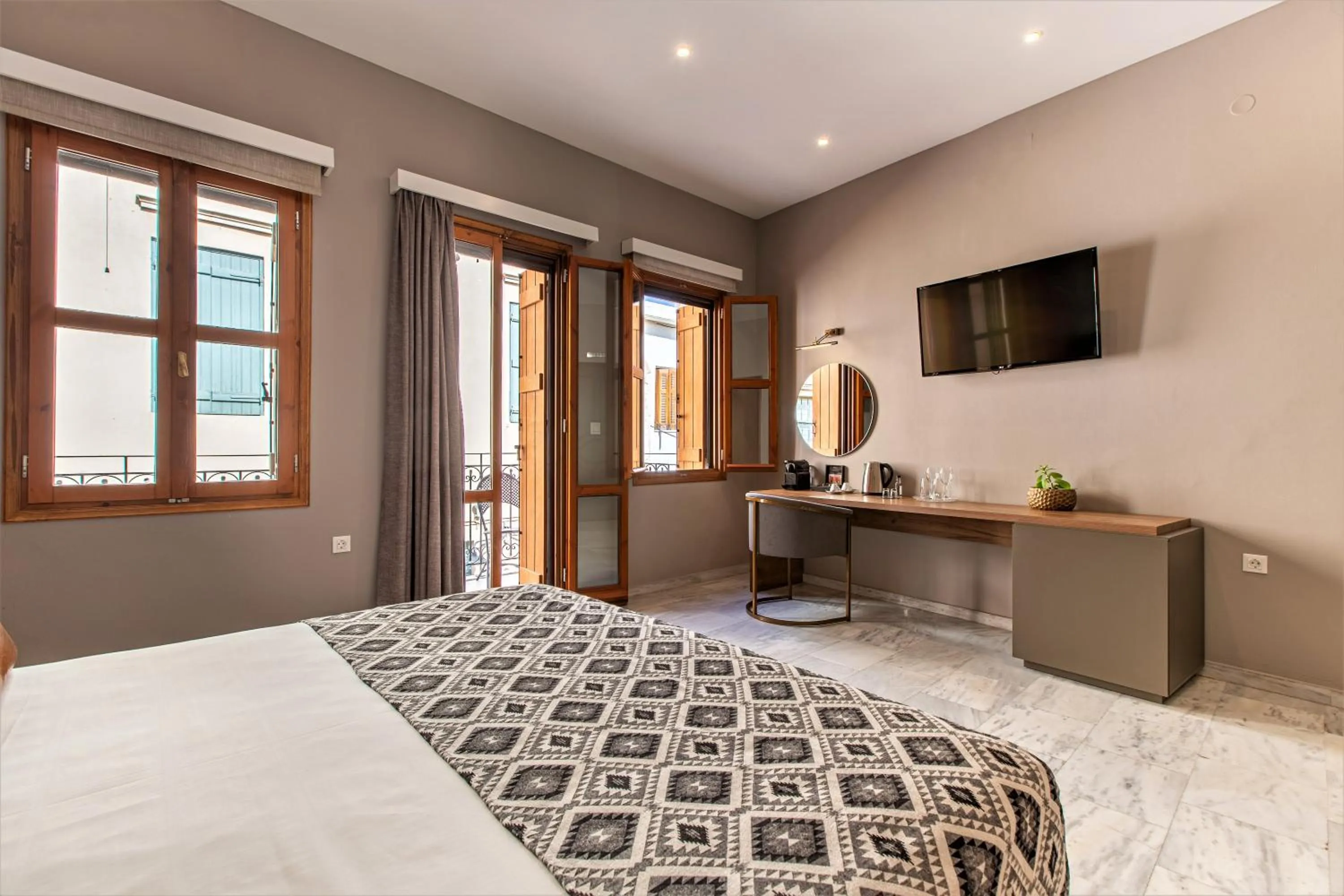 Bed in Minaret Suites and Apartments