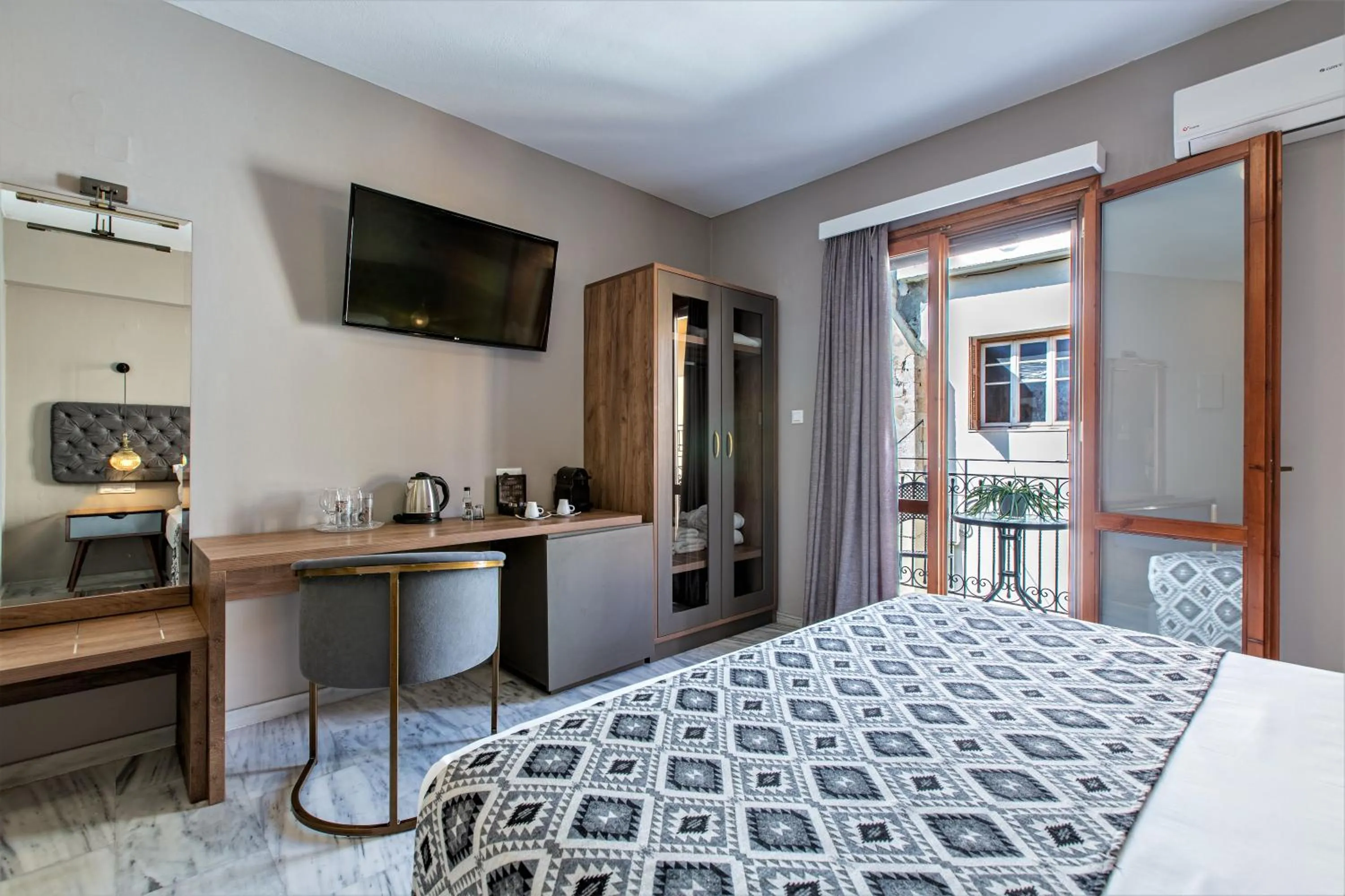 Bed in Minaret Suites and Apartments