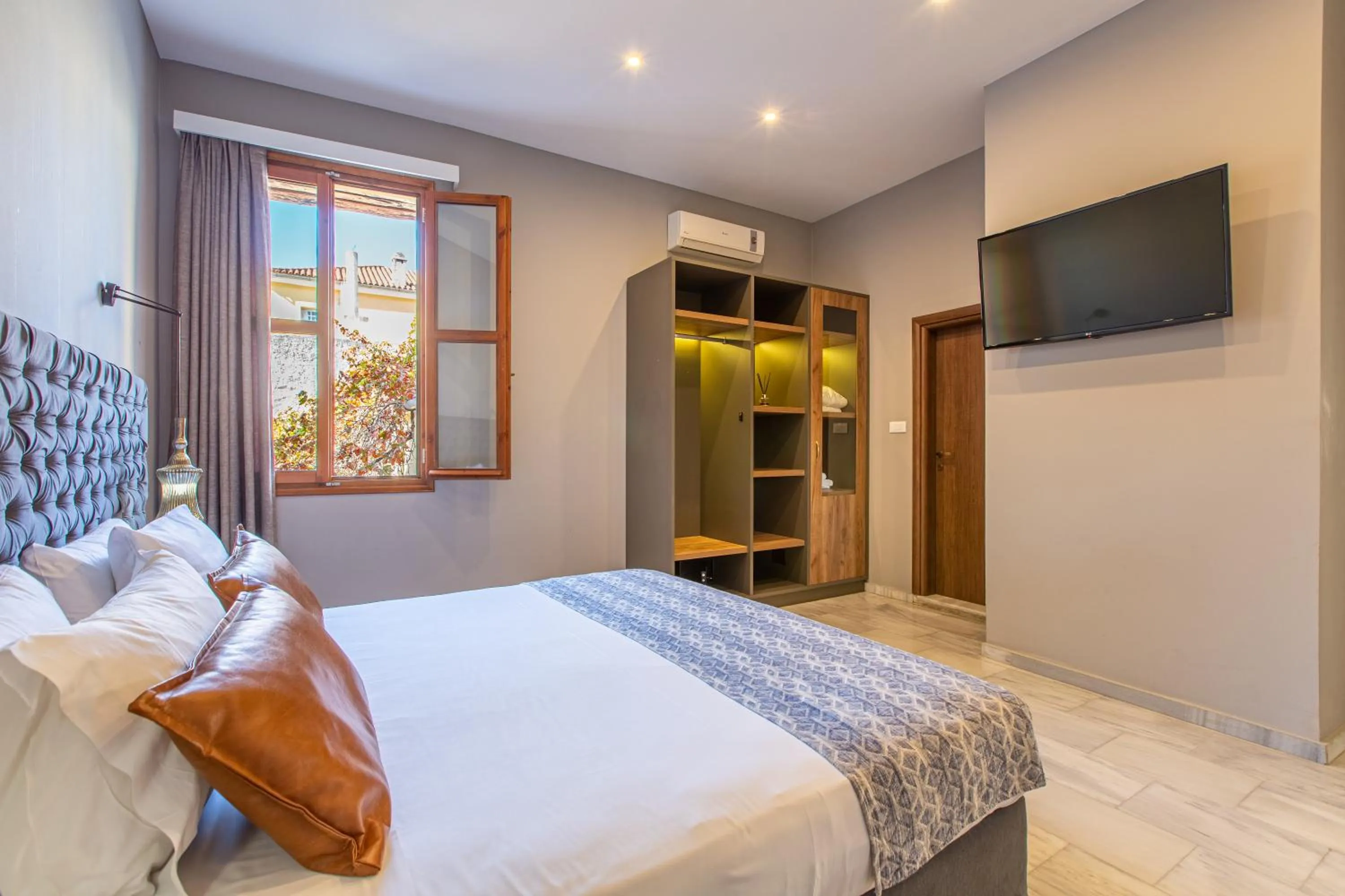 Bed in Minaret Suites and Apartments