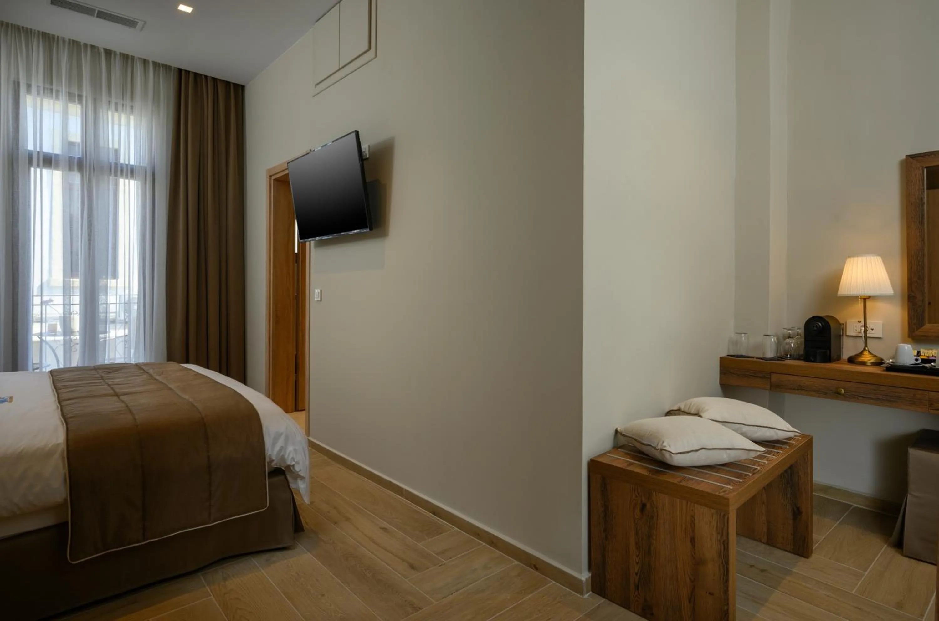 Bed in Minaret Suites and Apartments