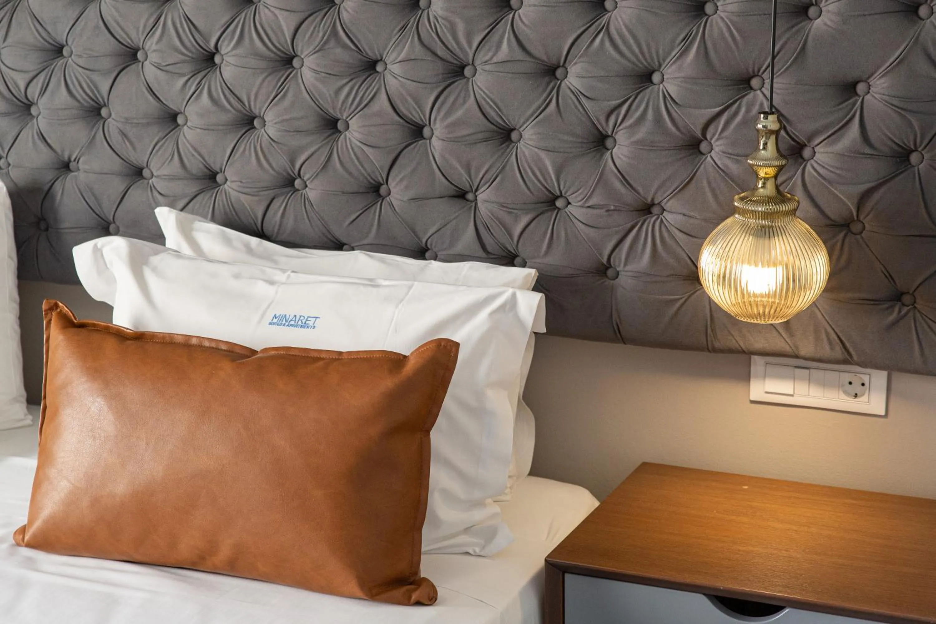 Bed in Minaret Suites and Apartments