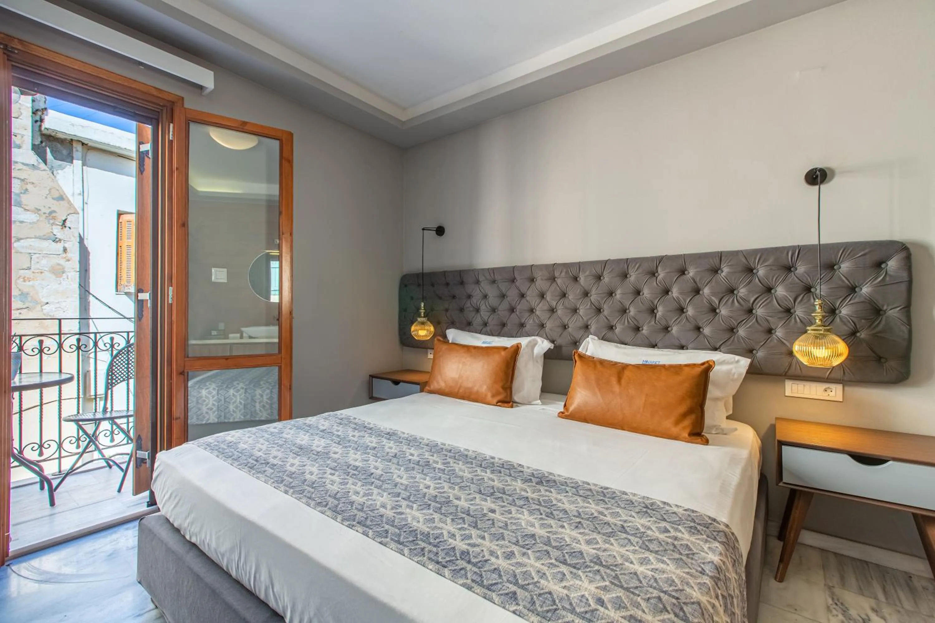Bed in Minaret Suites and Apartments