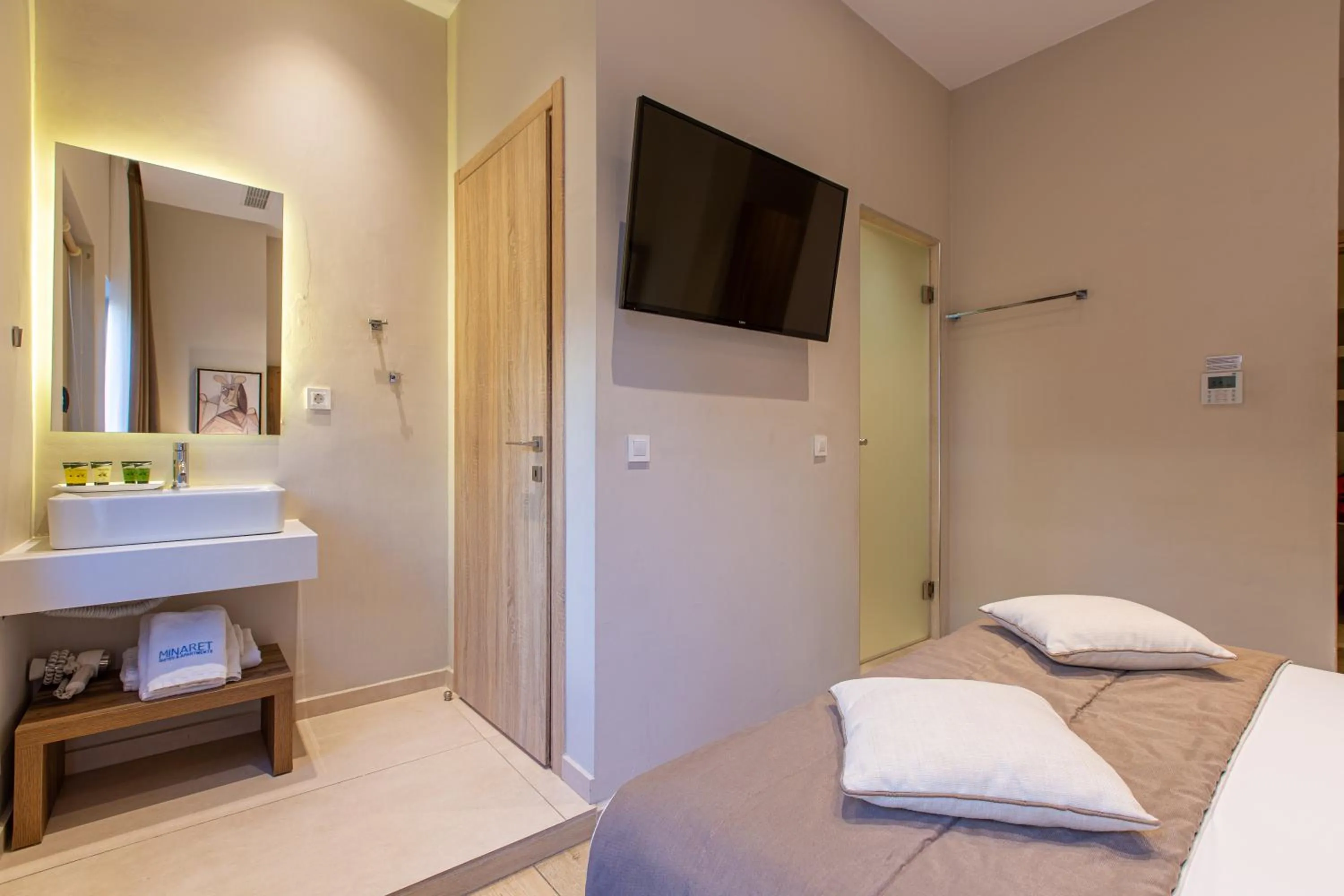 Bed in Minaret Suites and Apartments