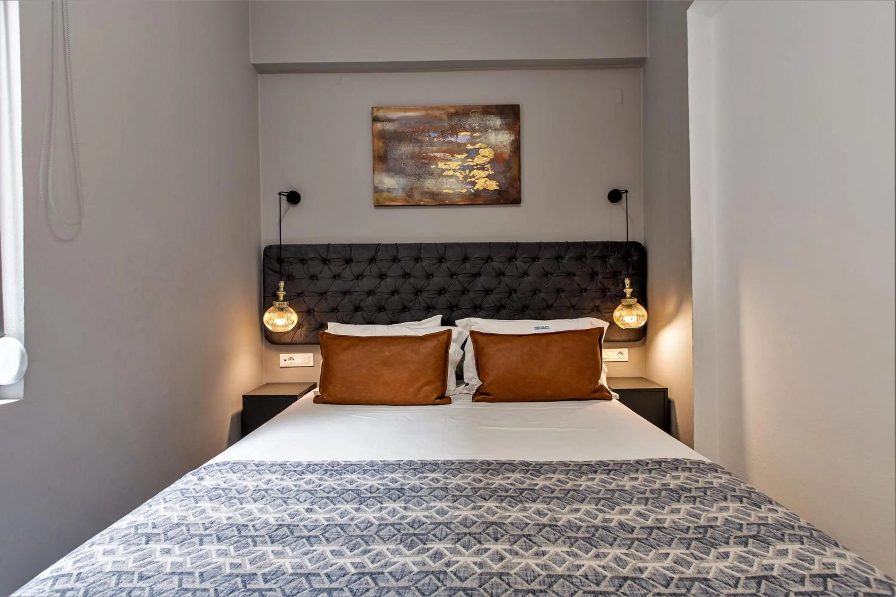 Bed in Minaret Suites and Apartments