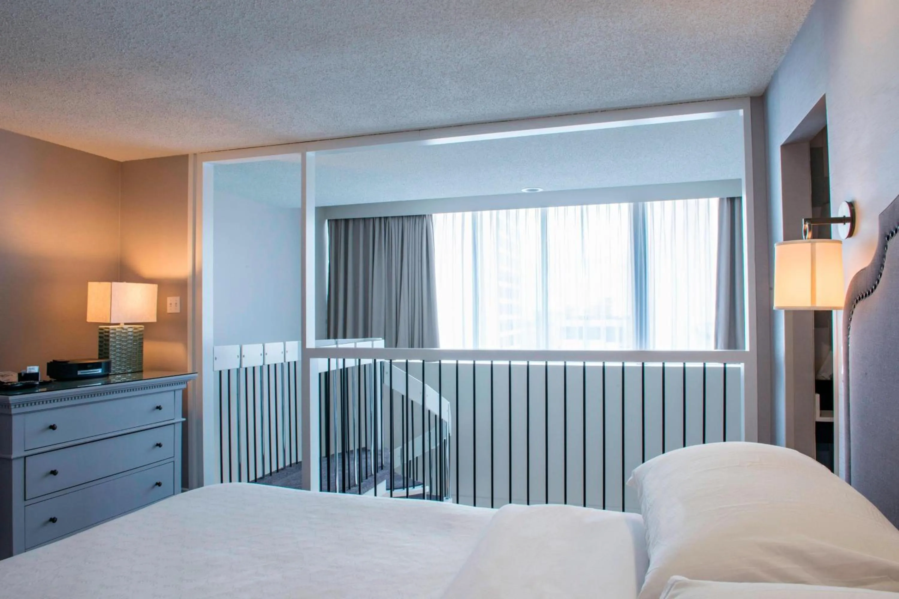 Photo of the whole room, Bed in Sheraton Cavalier Saskatoon Hotel