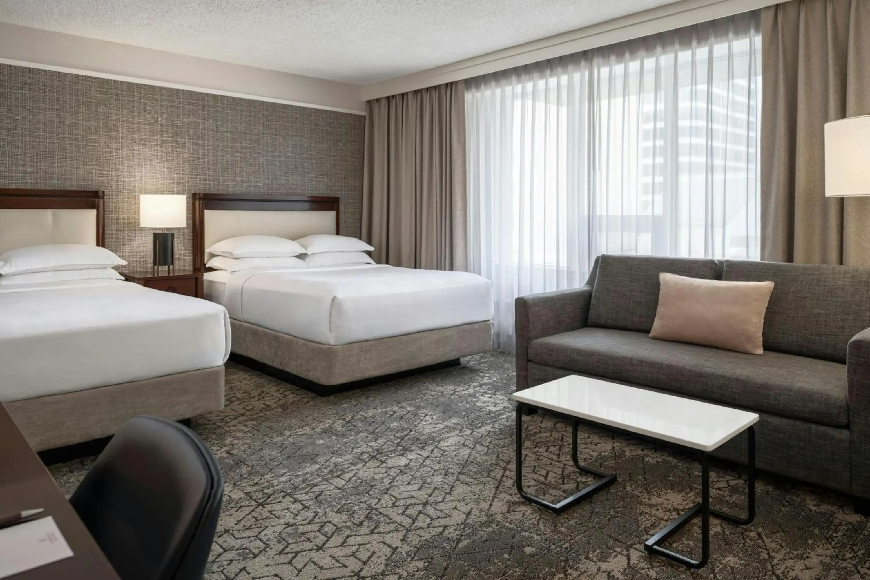 2 Queen and Sofa bed Deluxe Guest room in Sheraton Cavalier Saskatoon Hotel 2 Queen and Sofa bed Deluxe Guest room in Sheraton Cavalier Saskatoon Hotel