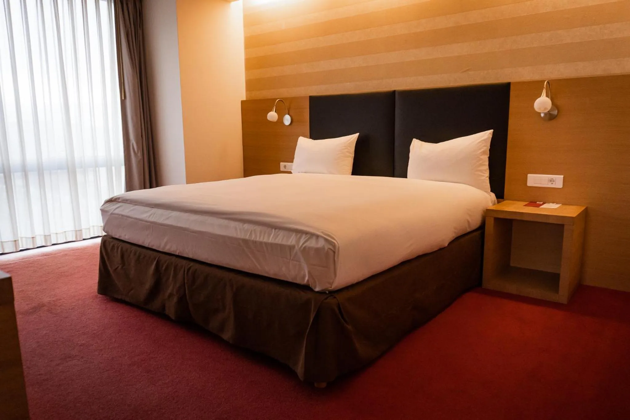 Bed in Ramada by Wyndham Oradea