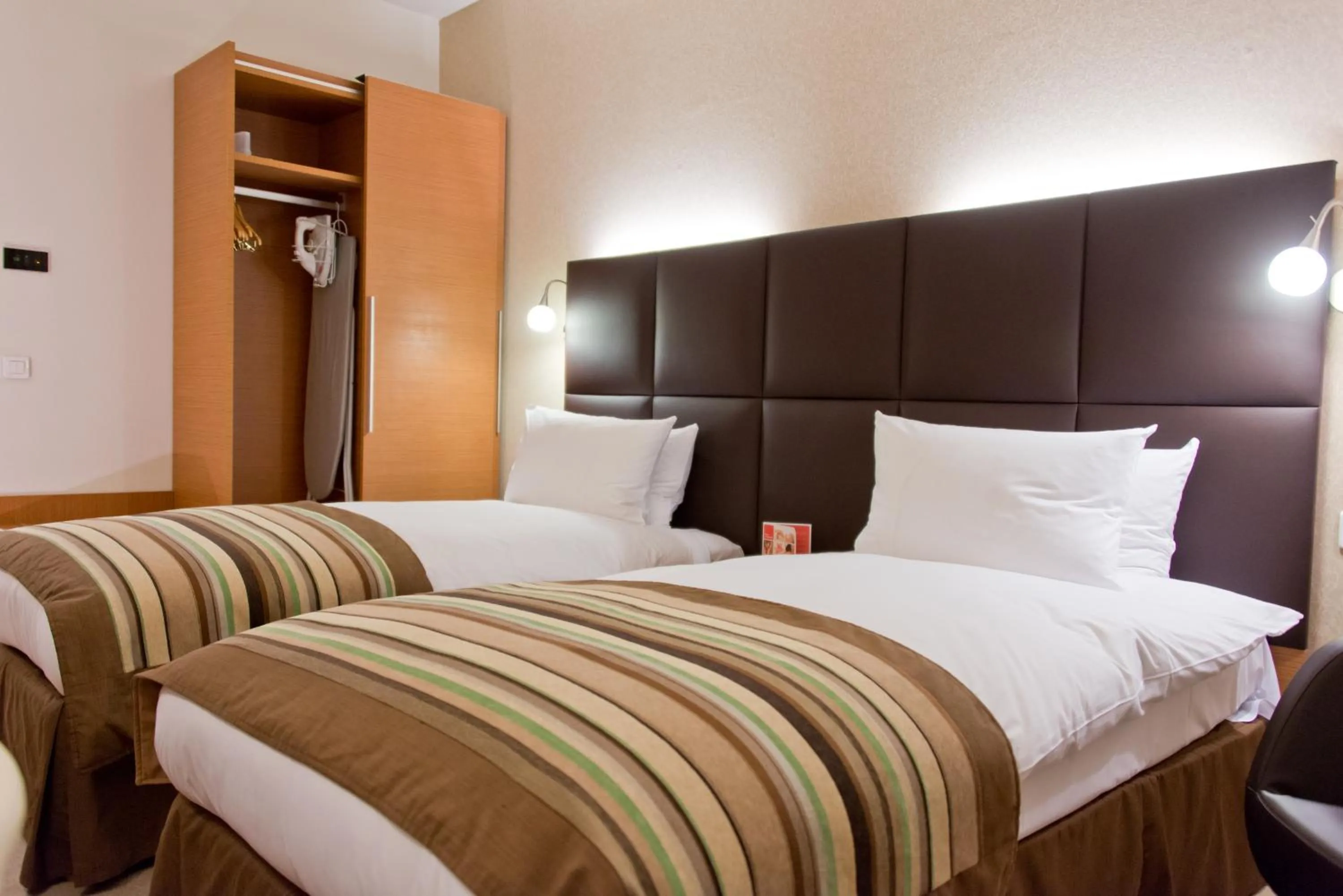 Bed in Ramada by Wyndham Oradea