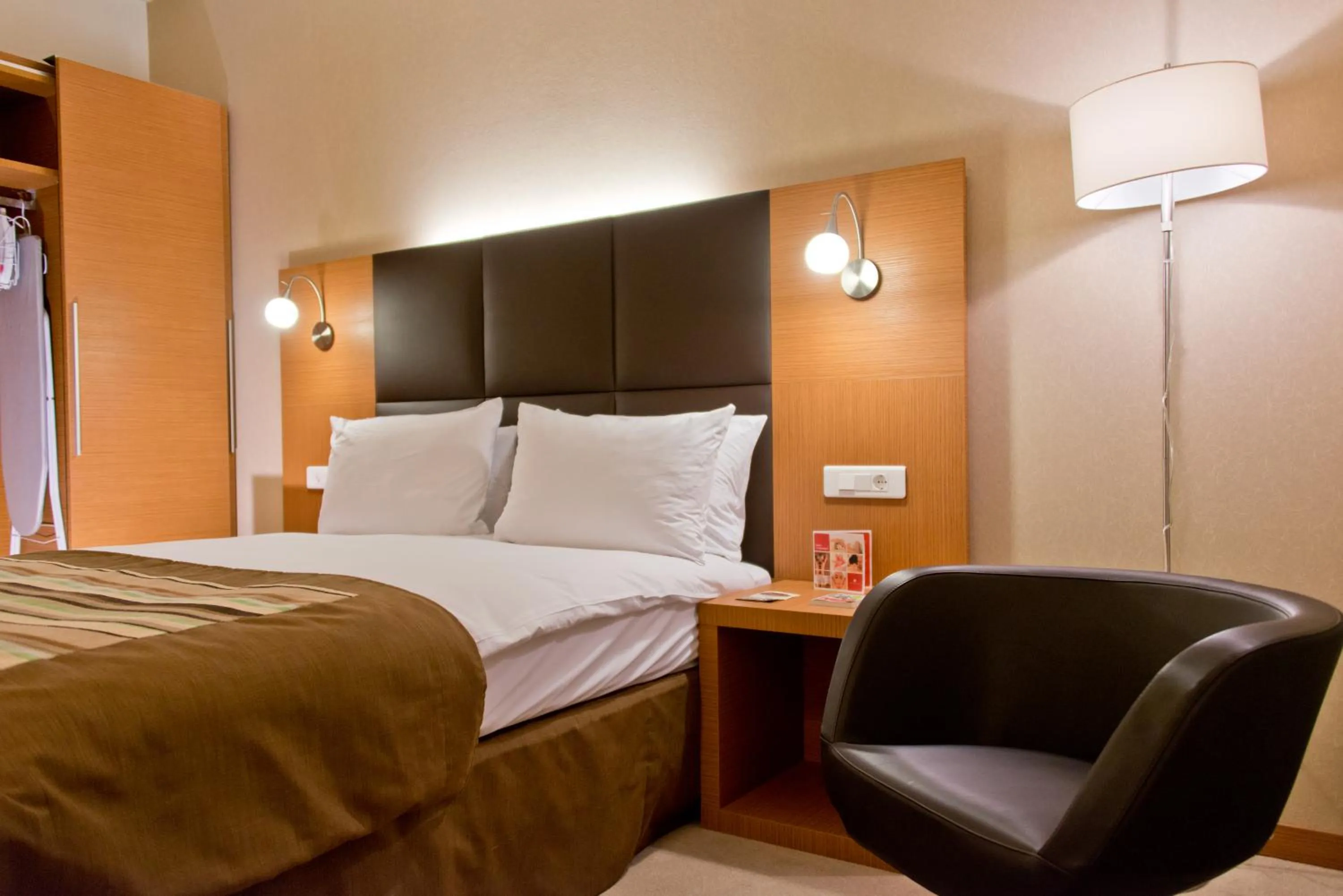 Bed in Ramada by Wyndham Oradea
