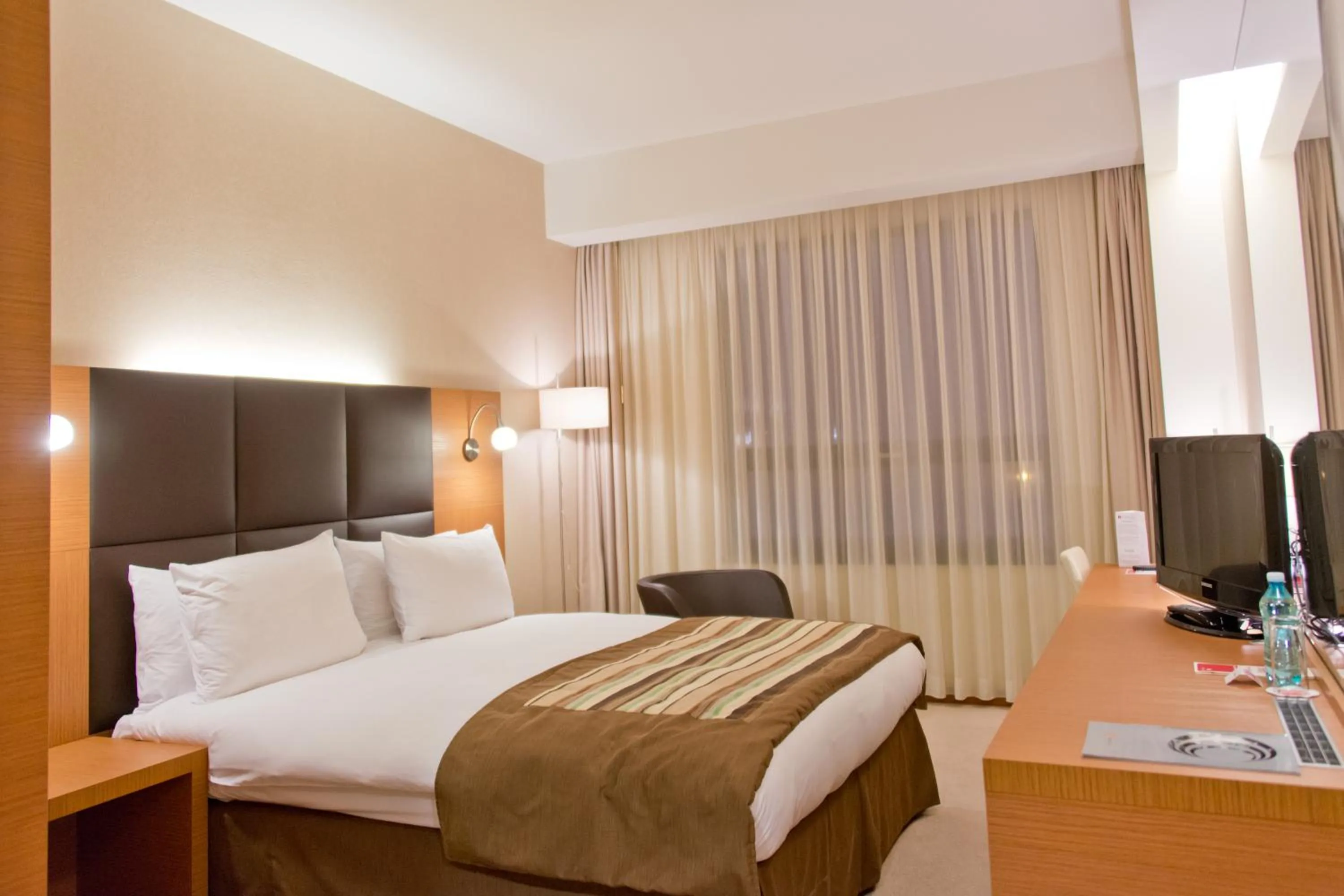 Bed in Ramada by Wyndham Oradea