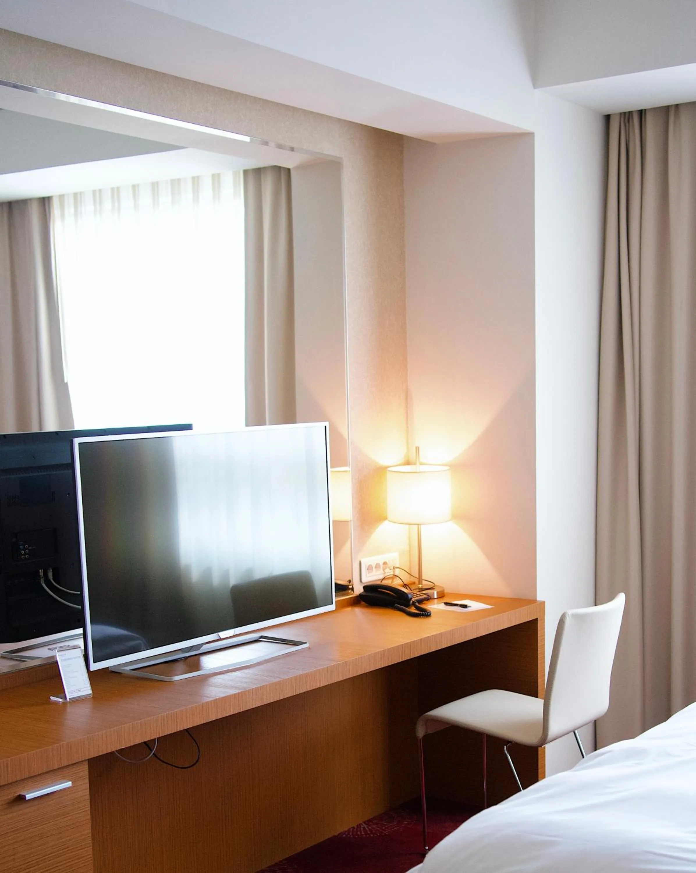 TV and multimedia, Bed in Ramada by Wyndham Oradea