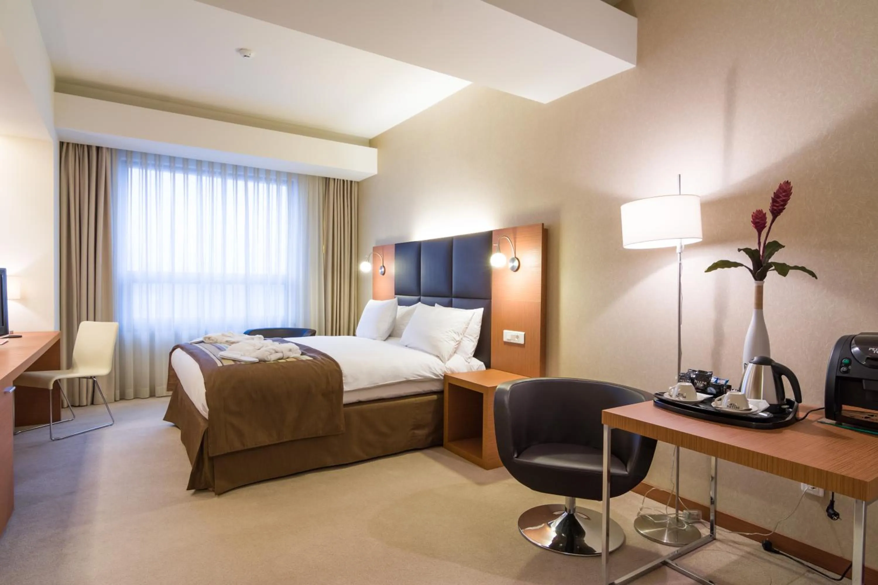 Bed in Ramada by Wyndham Oradea