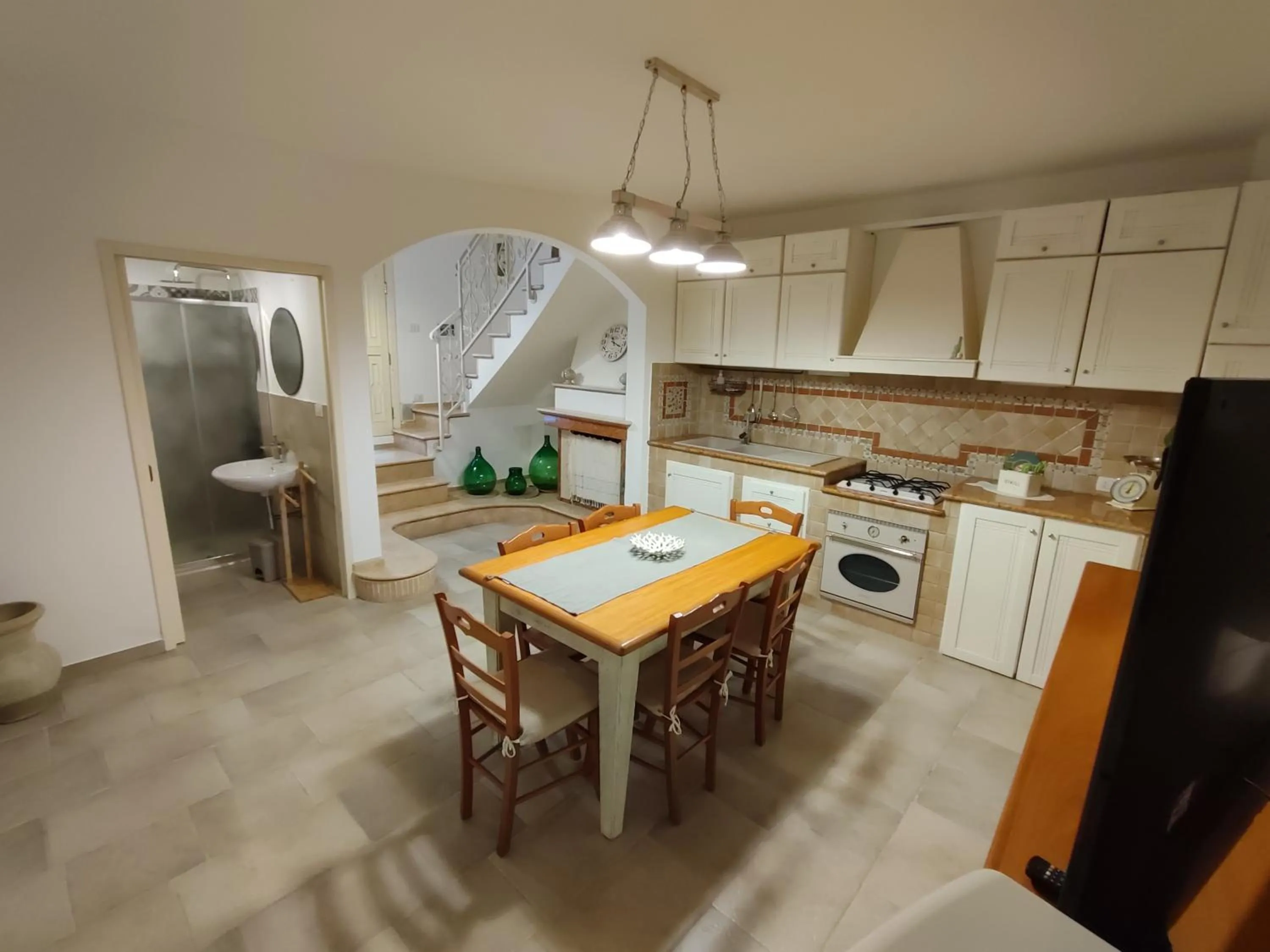 Kitchen or kitchenette in B&B Punta Cutieri