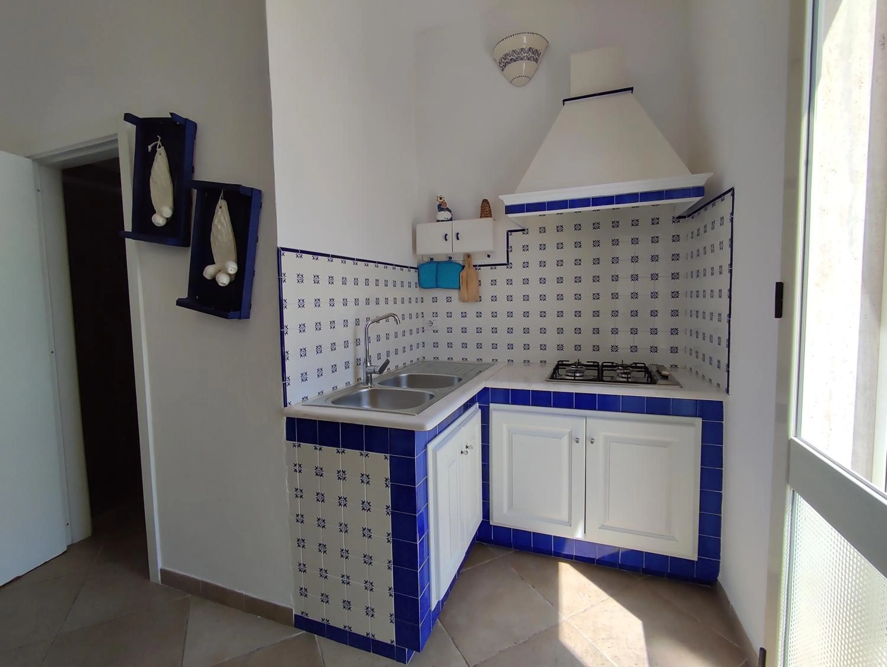 Kitchen or kitchenette in B&B Punta Cutieri