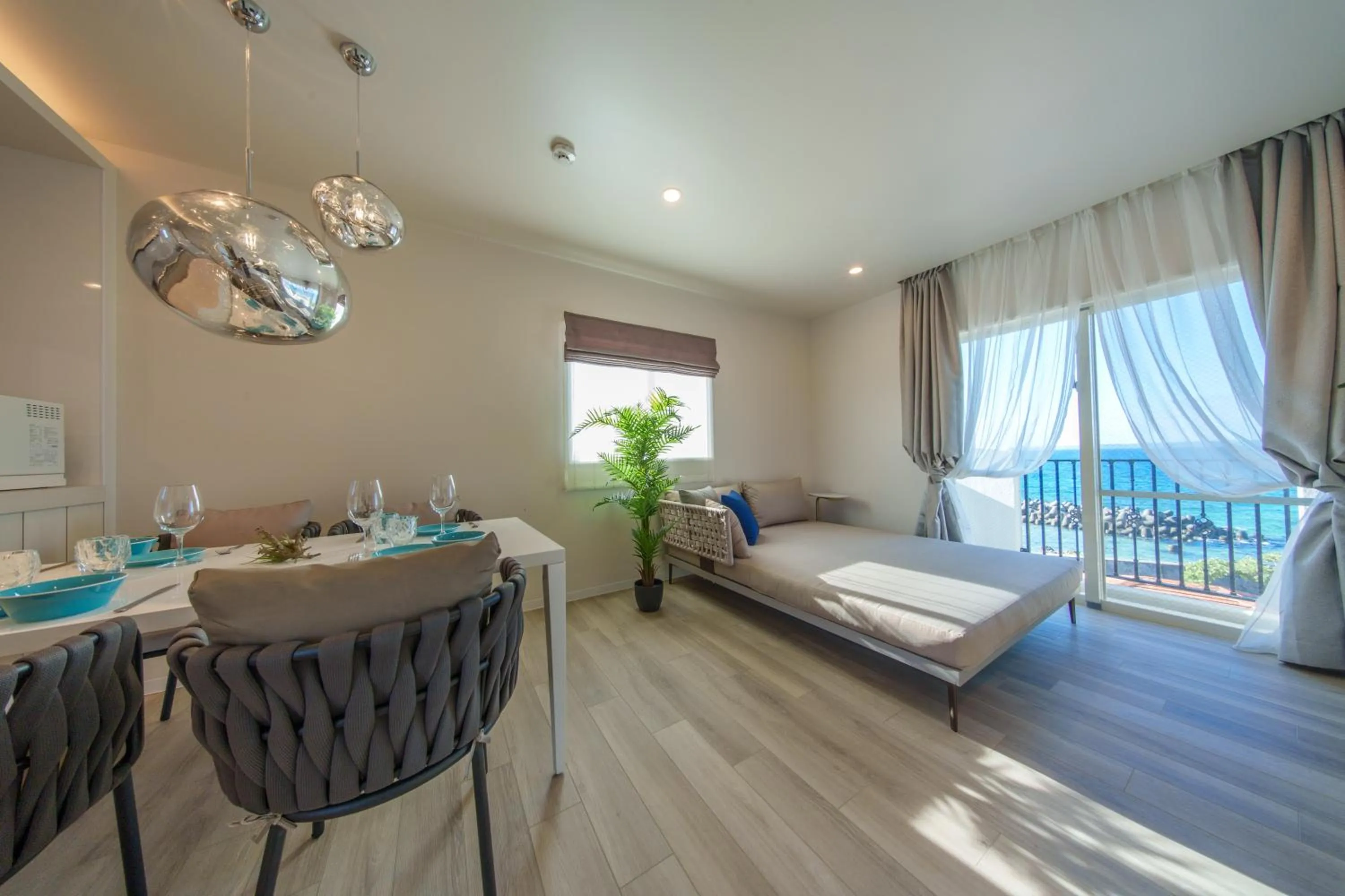 Living room, Bed in Crystal Villa ikema