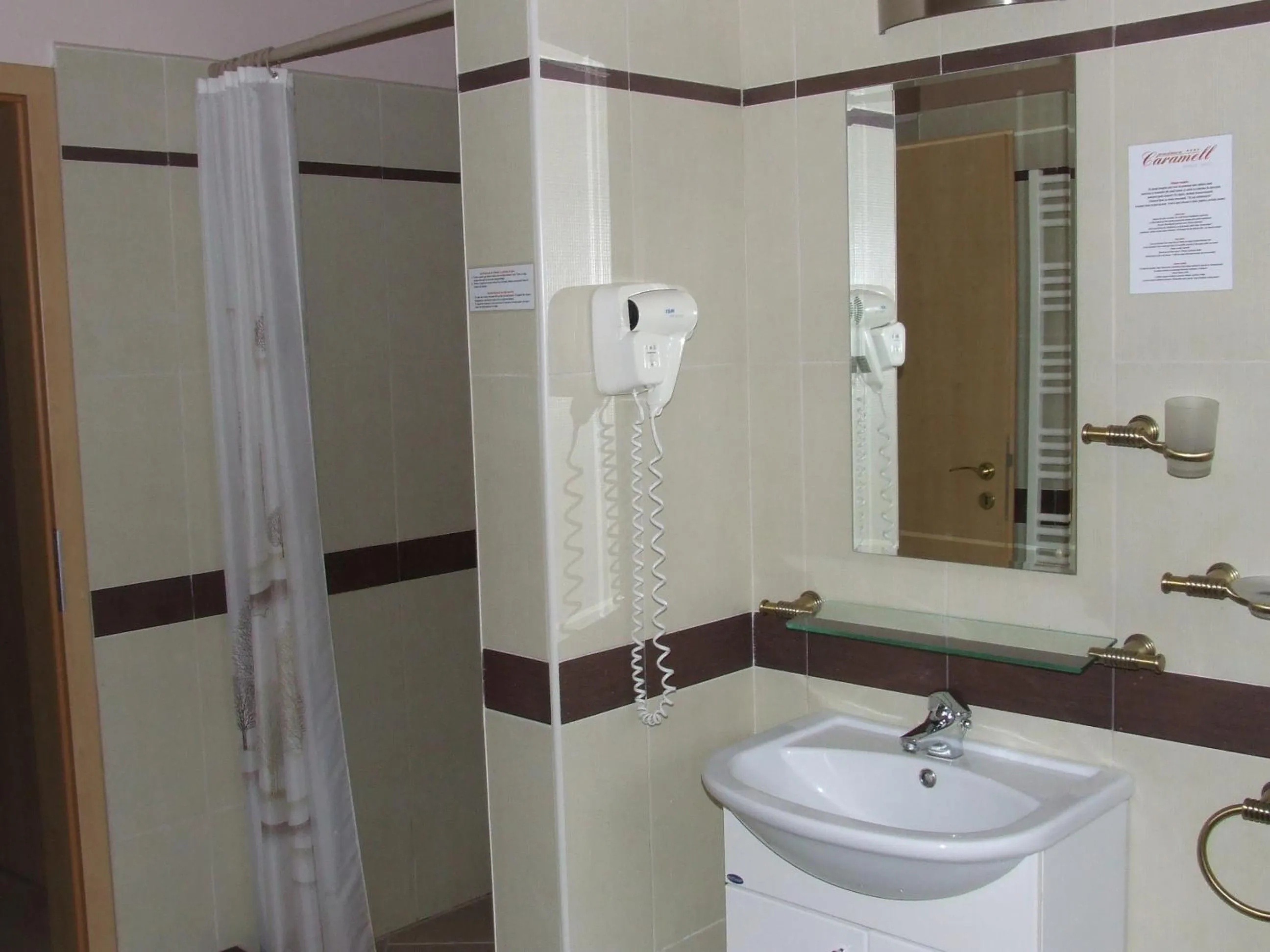 Bathroom in Pensiunea Caramell