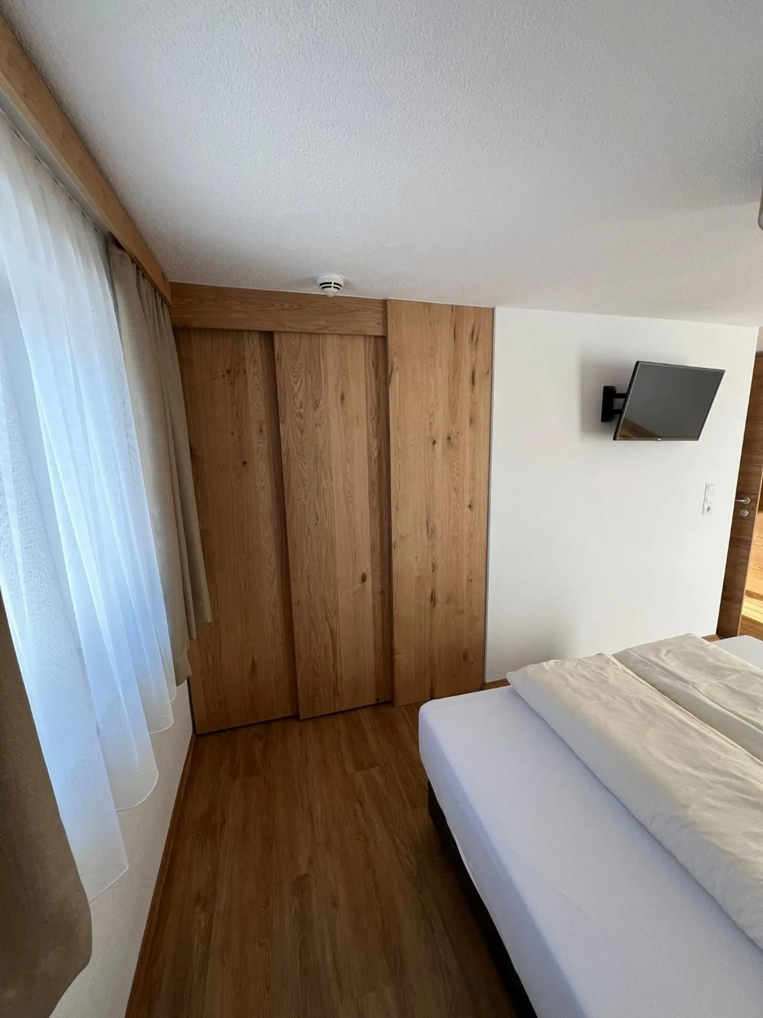 Bedroom, Bed in Berggasthof Hochzeigerhaus