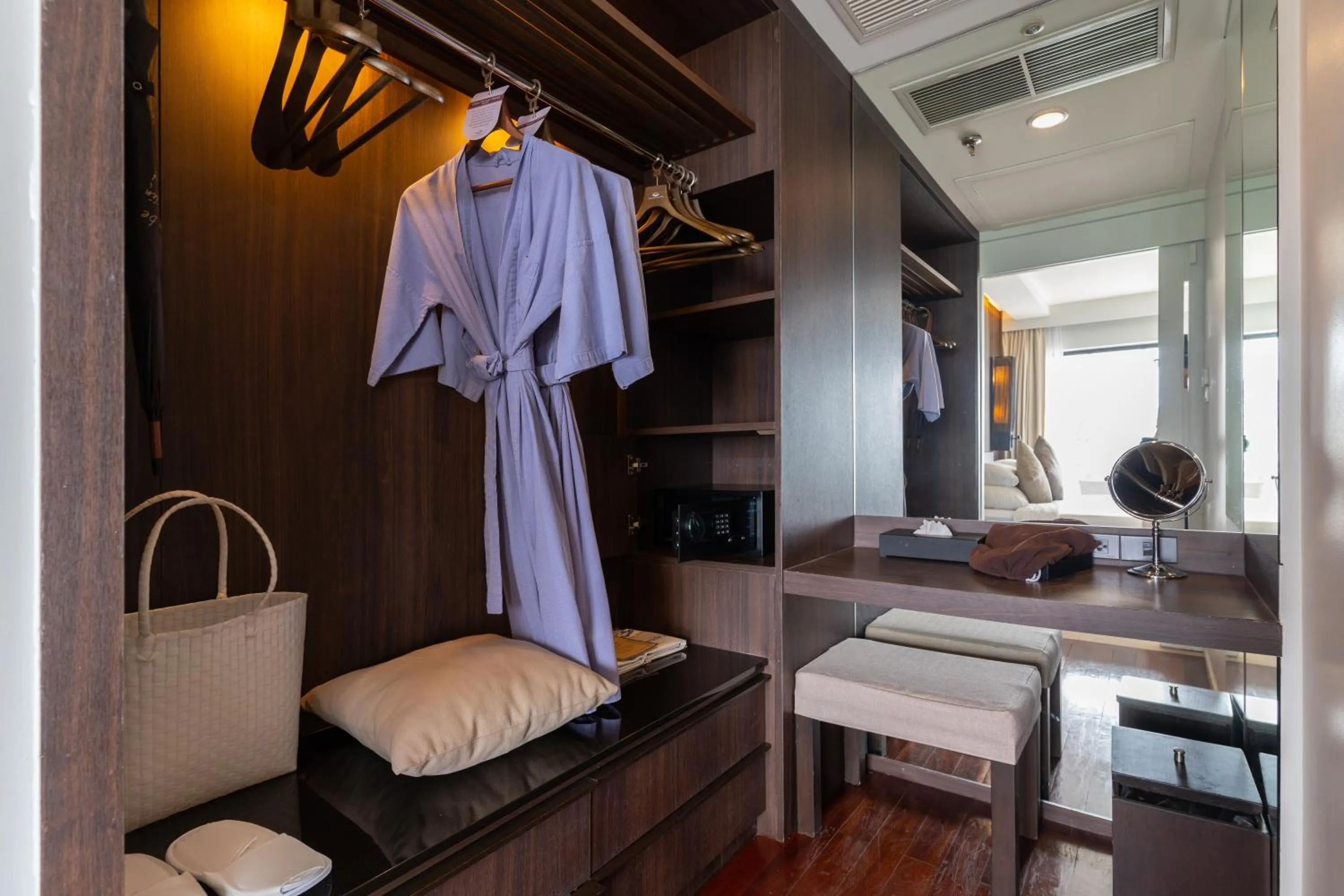 wardrobe, Bed in Cape Panwa Hotel Phuket
