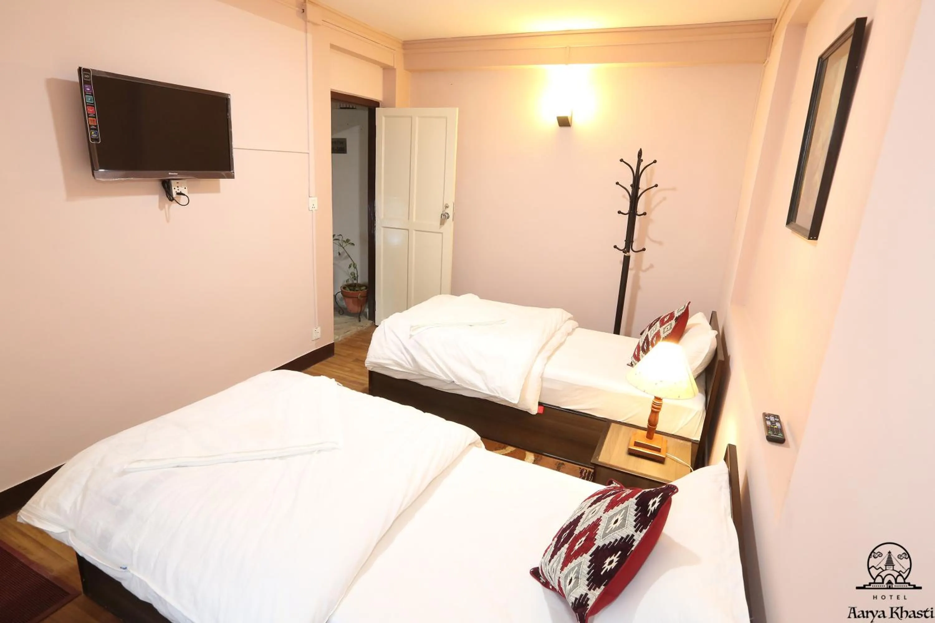 TV and multimedia, Bed in Aarya Chaitya Inn