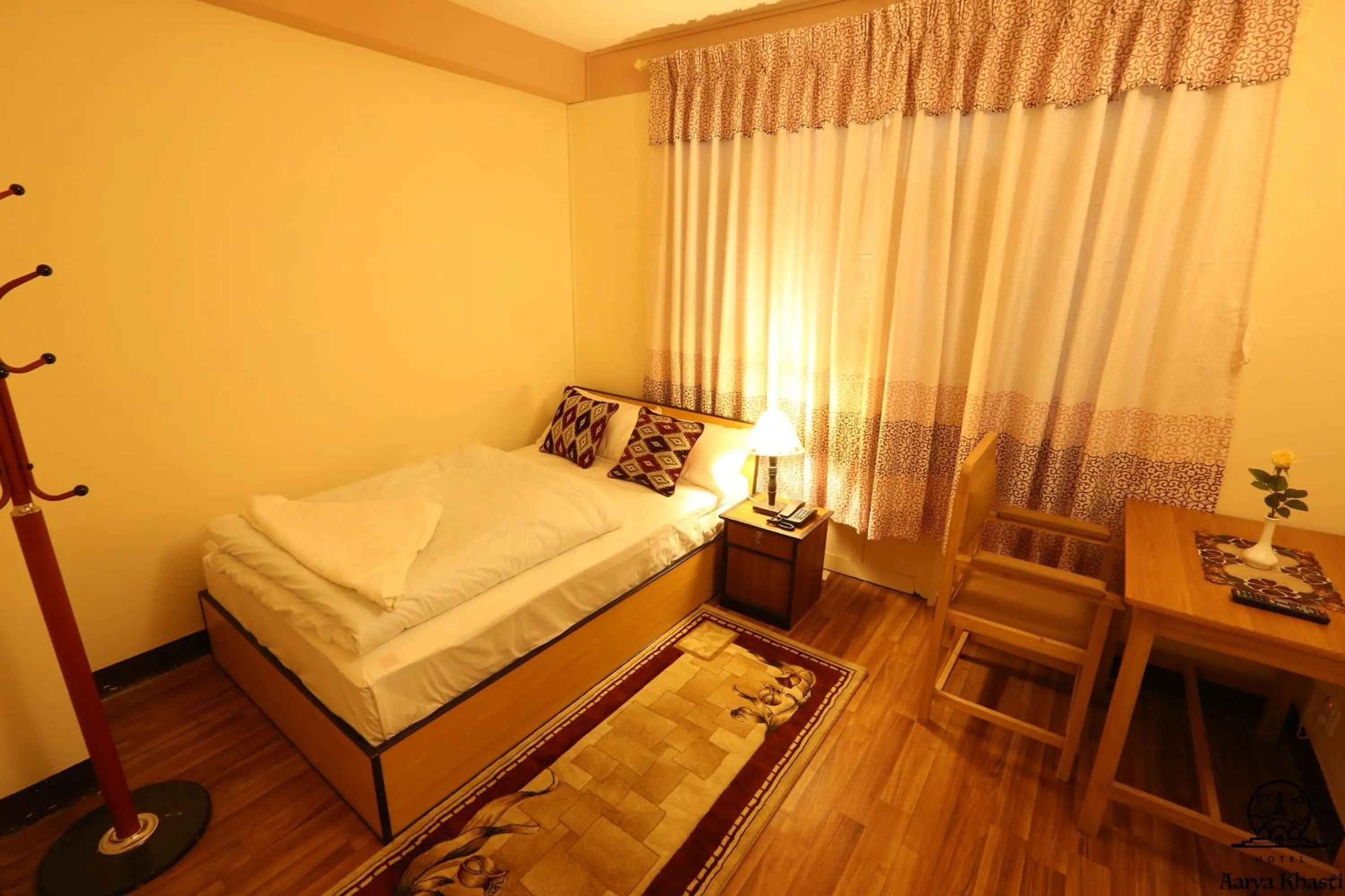 Bathroom, Bed in Aarya Chaitya Inn