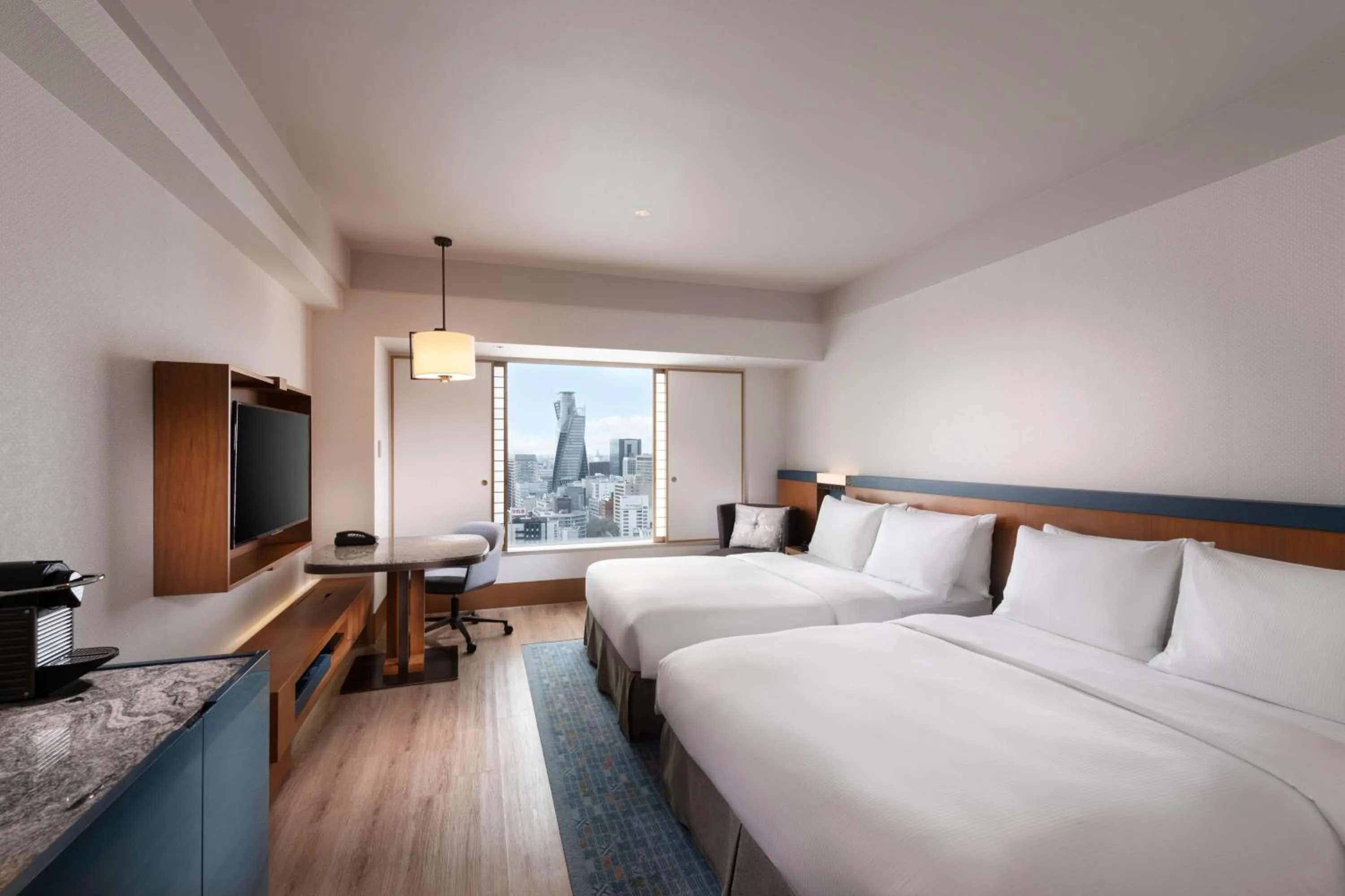 Bed in Hilton Nagoya Hotel