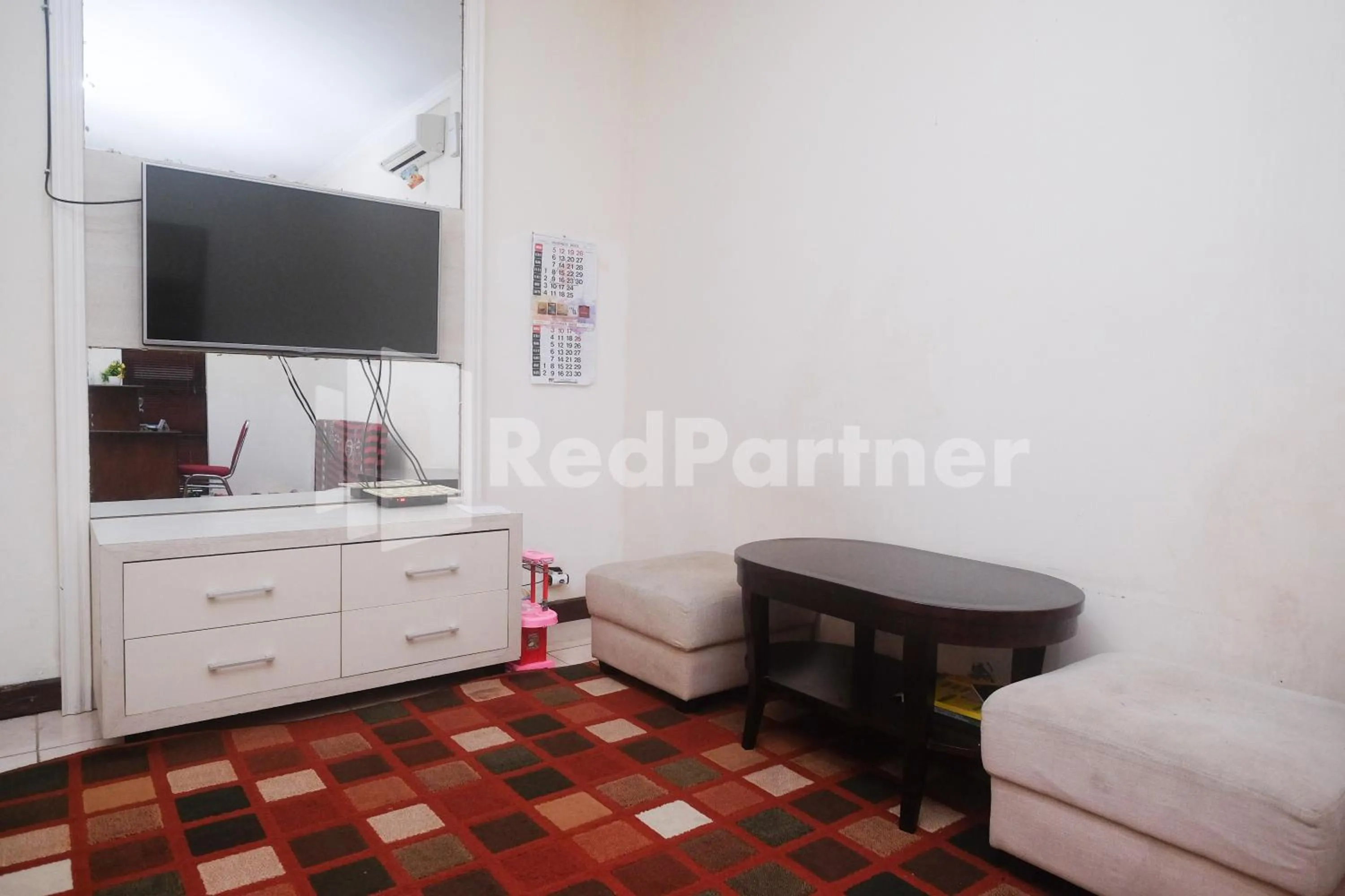 Bedroom in Tatti Inn Syariah Seturan RedPartner