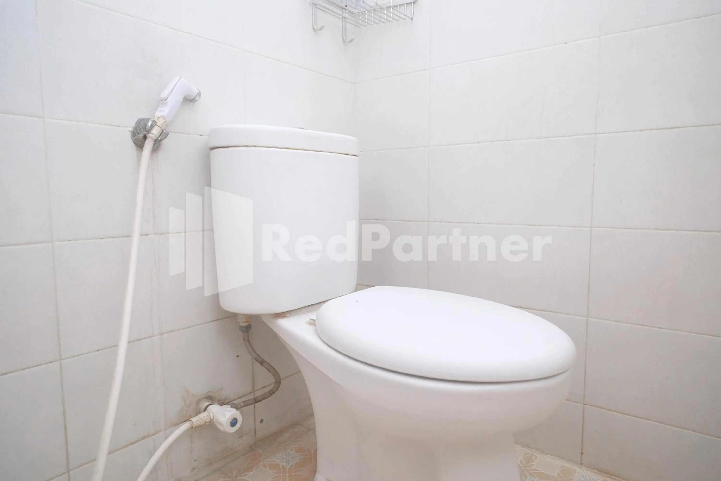 Bathroom in Tatti Inn Syariah Seturan RedPartner