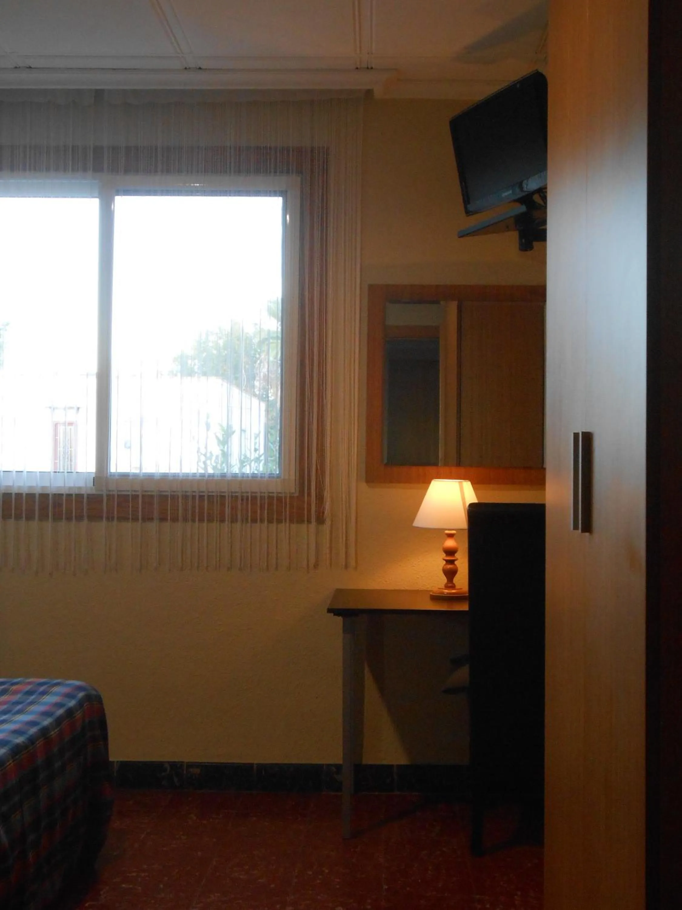 Bed in Hostal El Callejón