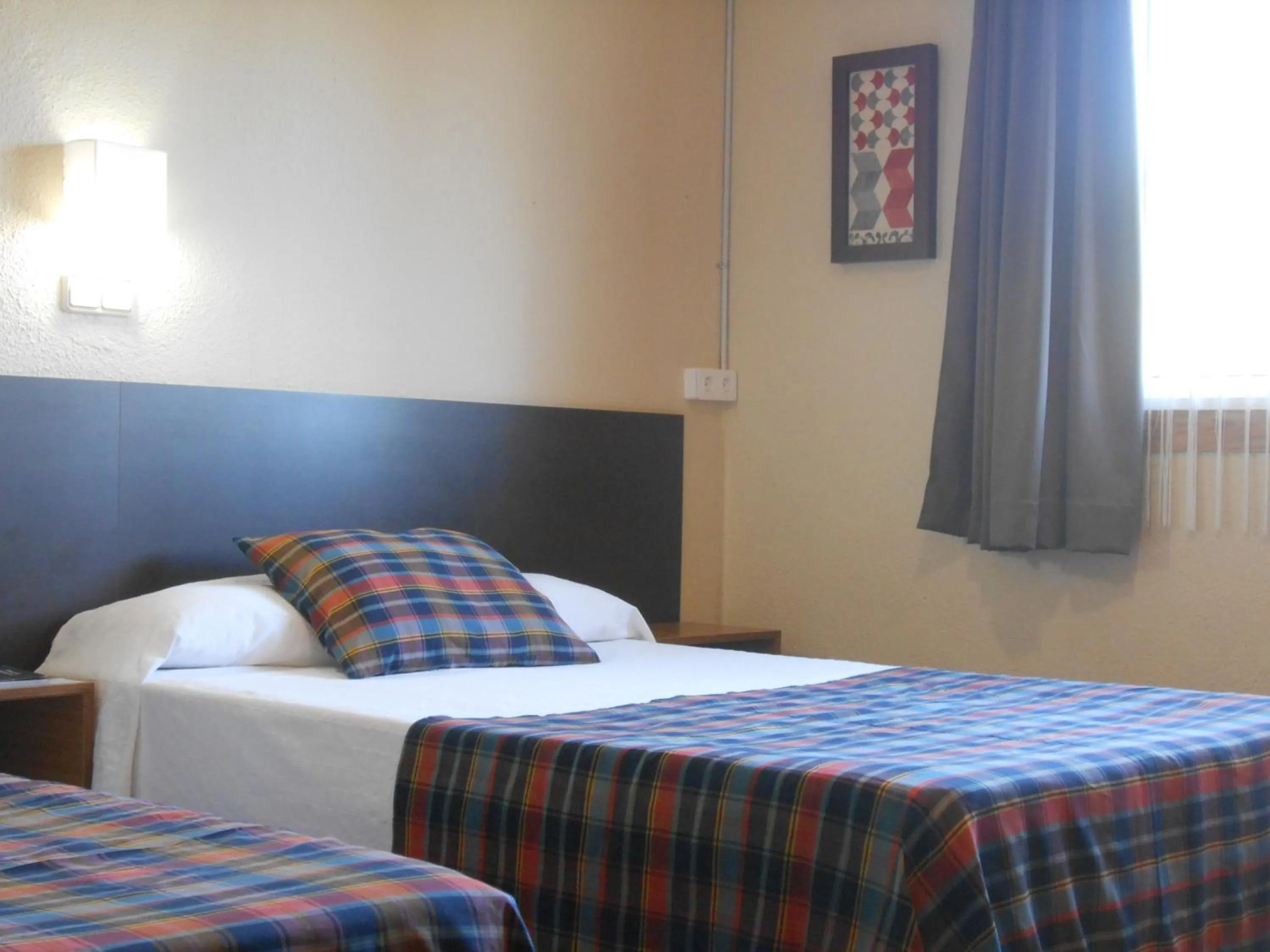 Bed in Hostal El Callejón