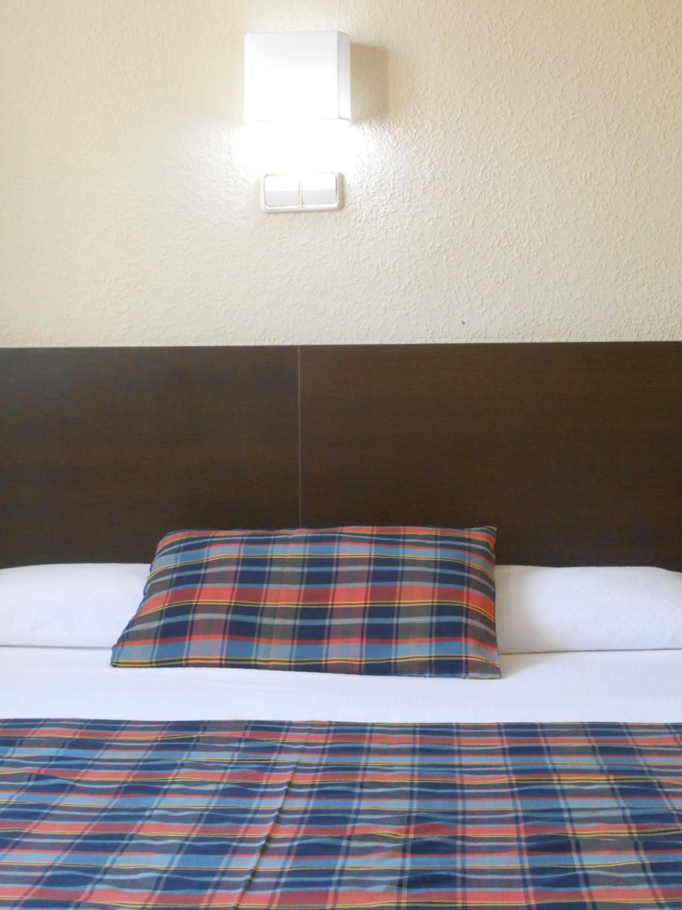 Bed in Hostal El Callejón