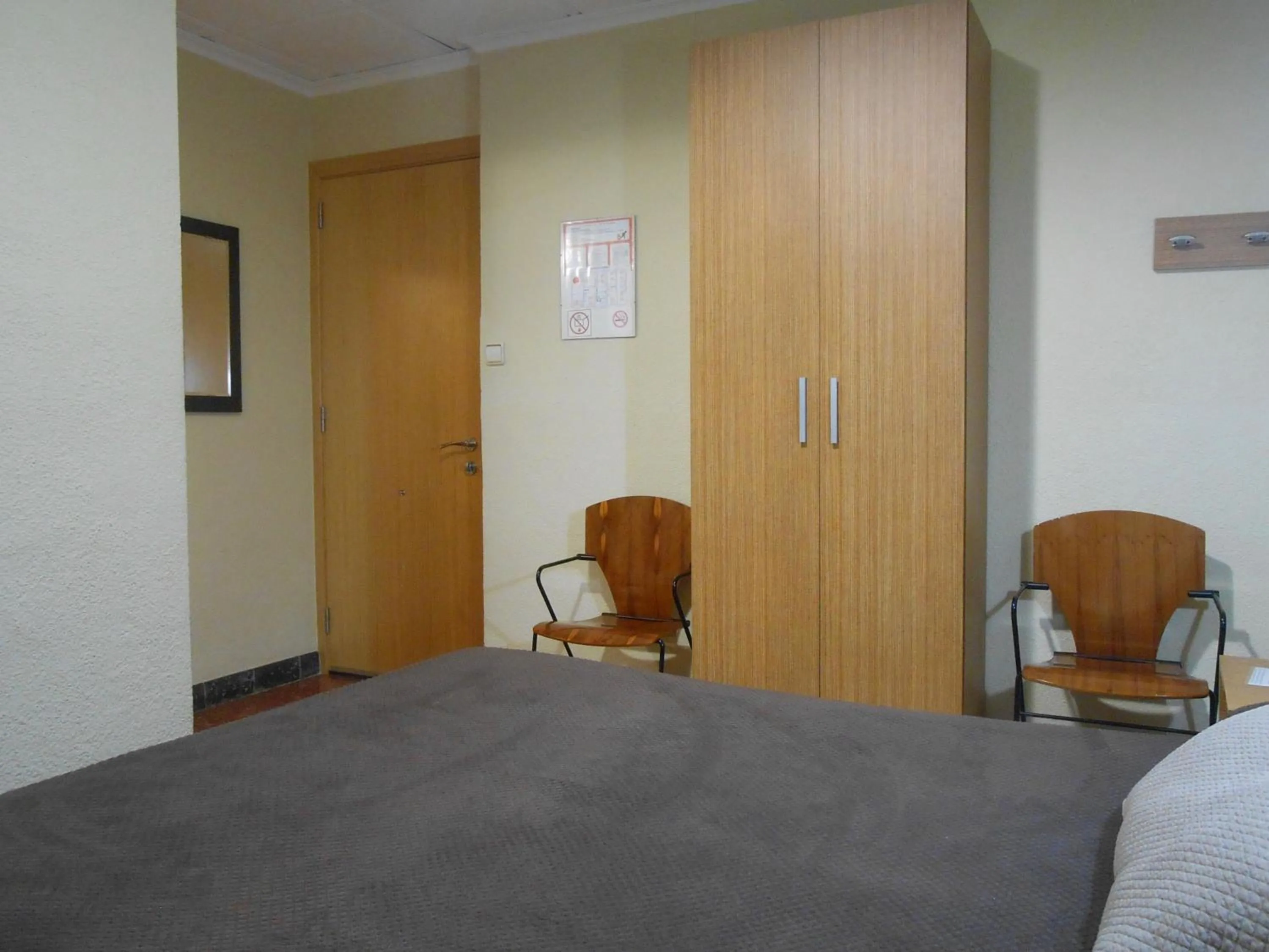 Bed in Hostal El Callejón