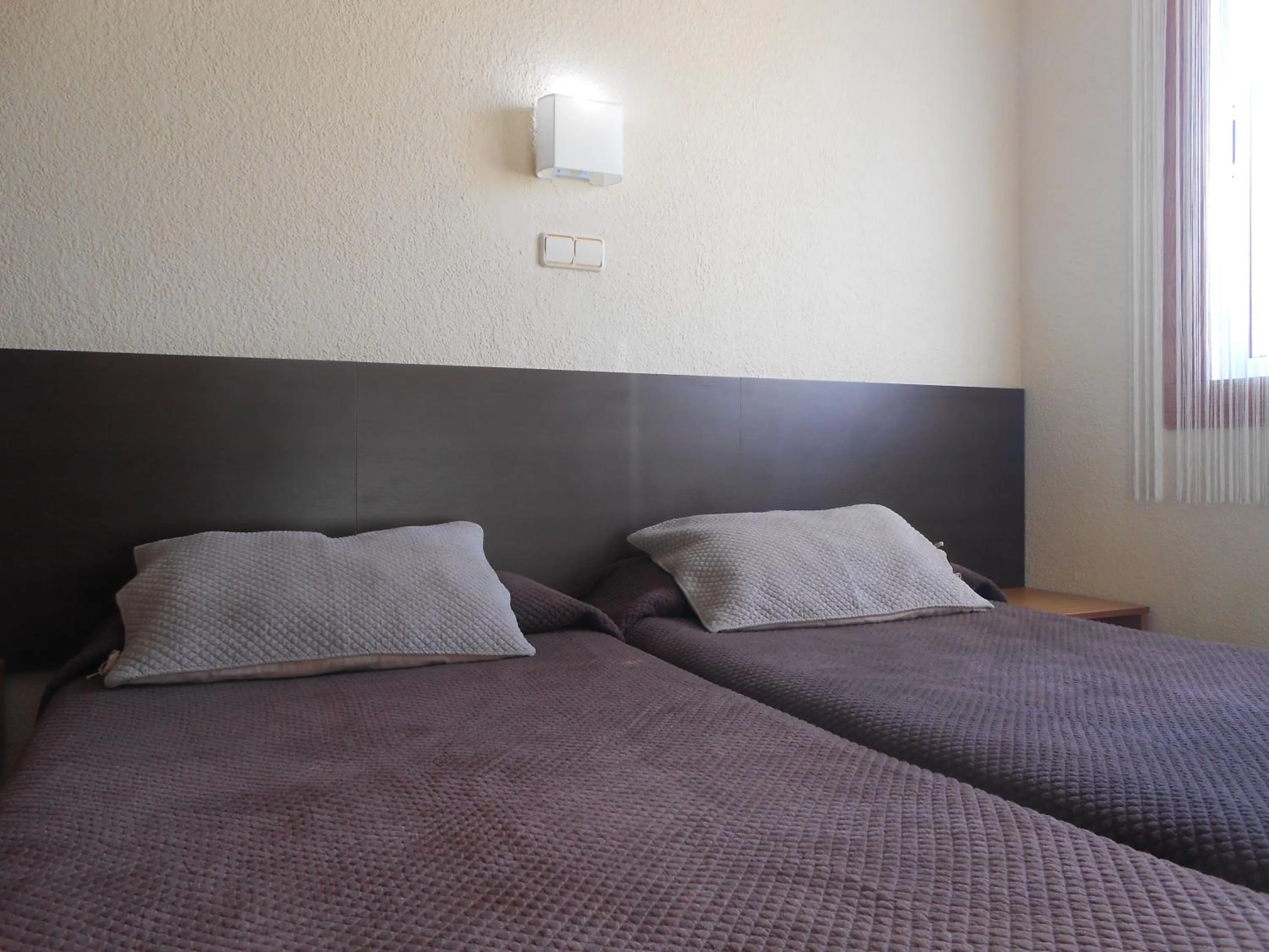 Bed in Hostal El Callejón